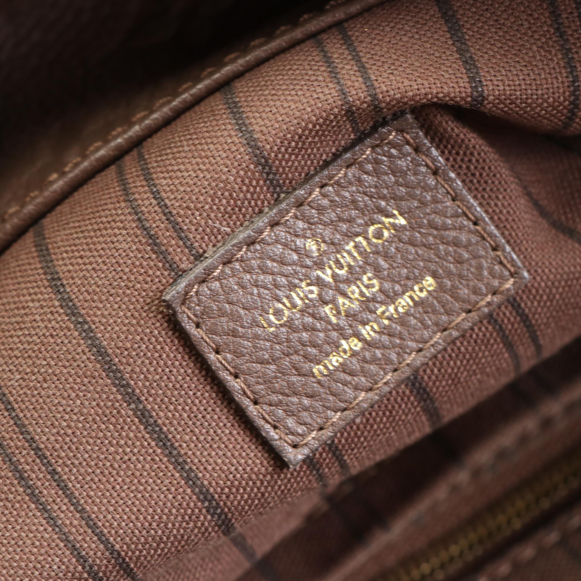 Louis Vuitton Artsy Handbag MM in Monogram Empreinte Leather