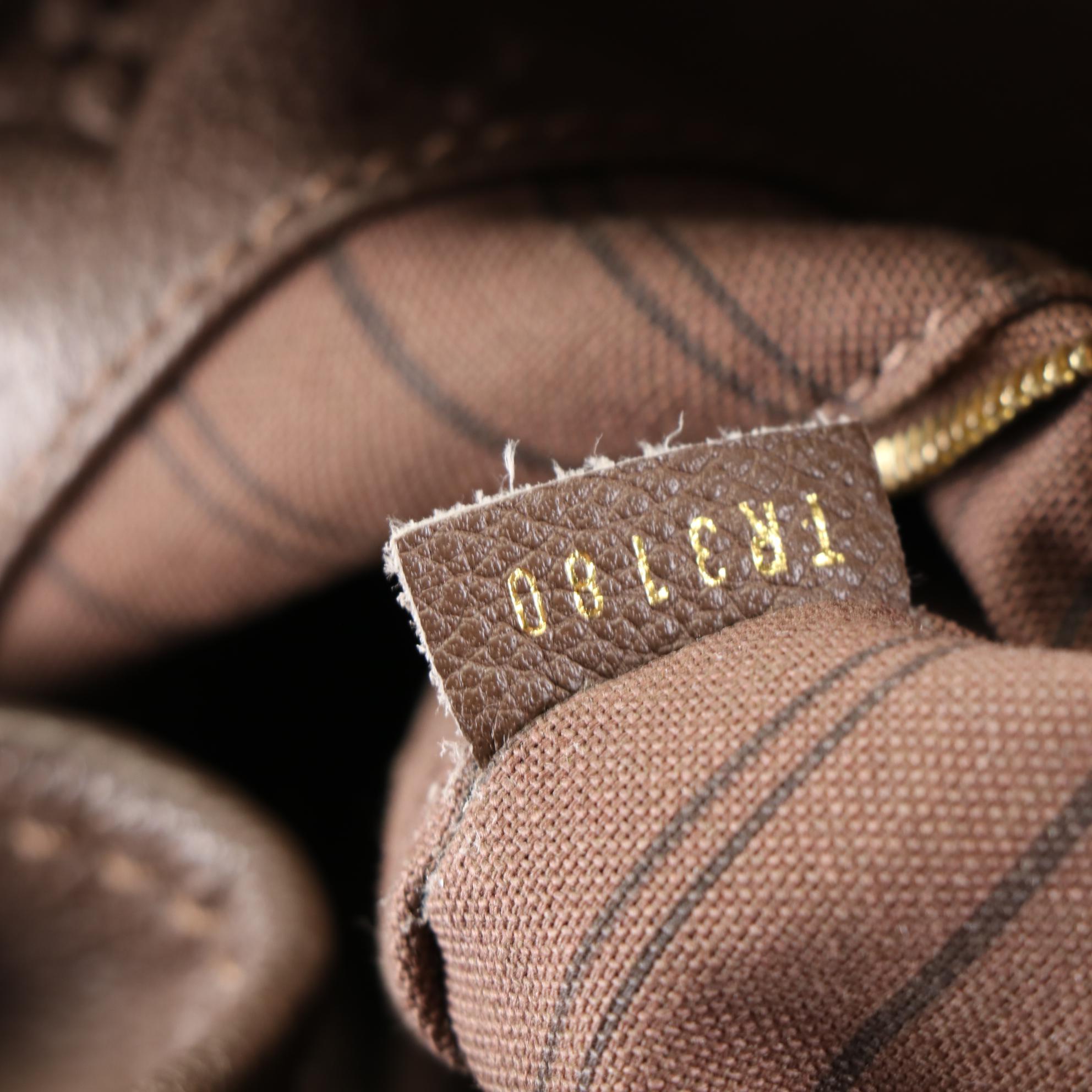 Louis Vuitton Artsy Handbag MM in Monogram Empreinte Leather