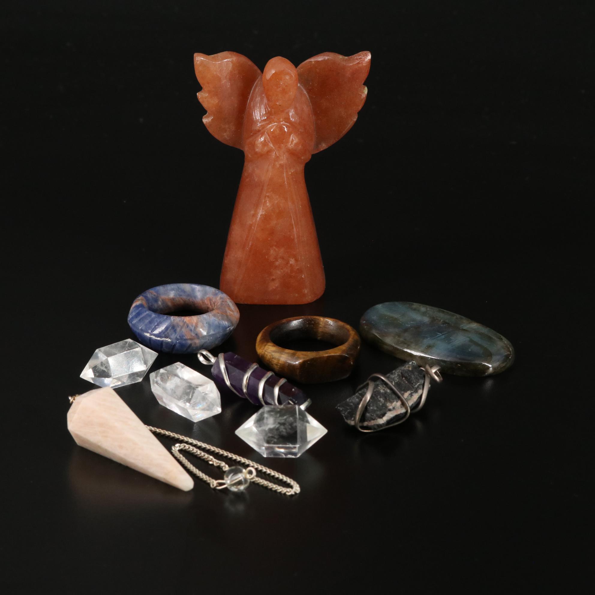 Carved and Polished Quartz, Labradorite, and Shorl Figurine and Jewelry