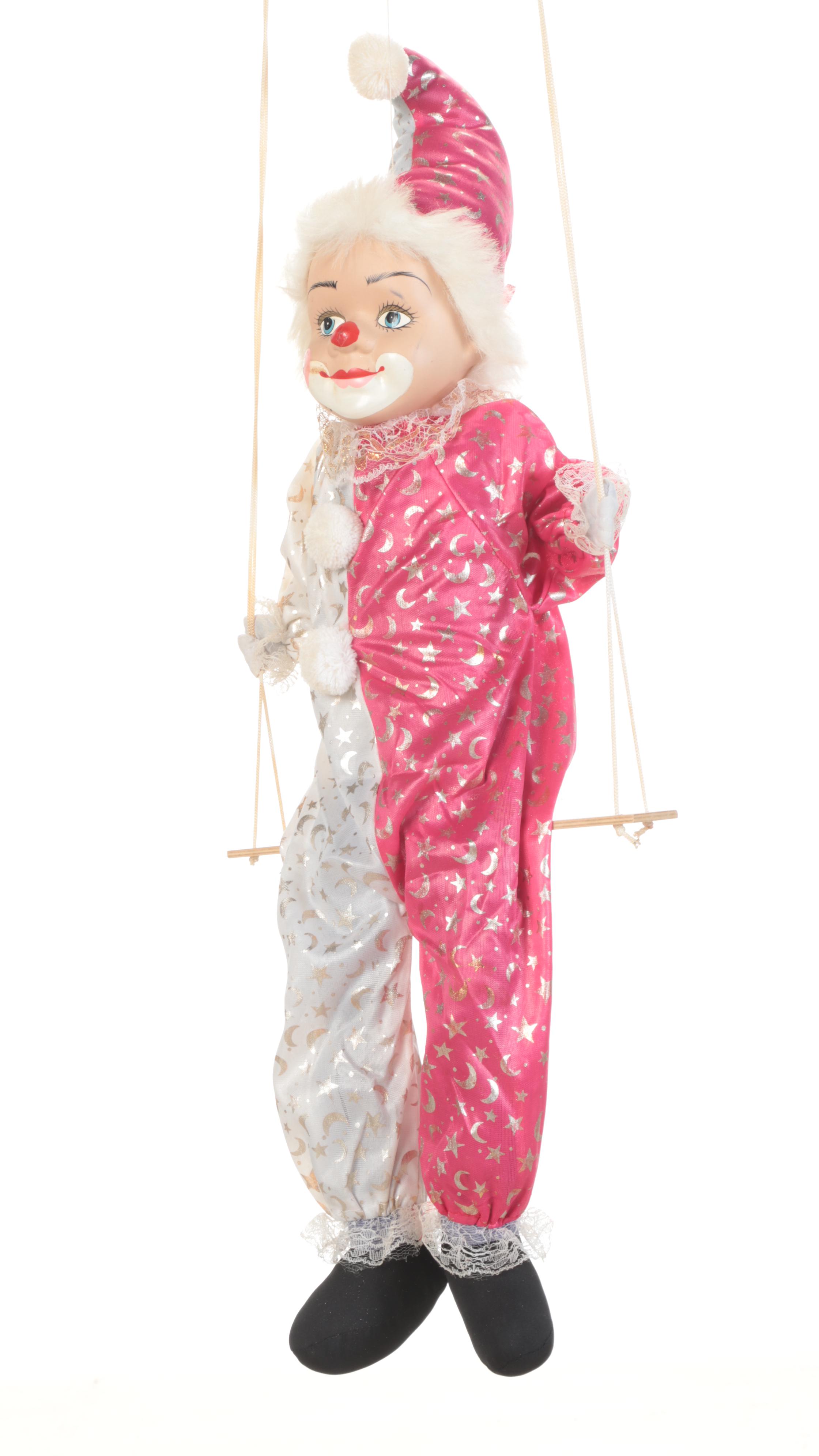 Hand-Painted Porcelain and Cloth Clown Dolls on Swings
