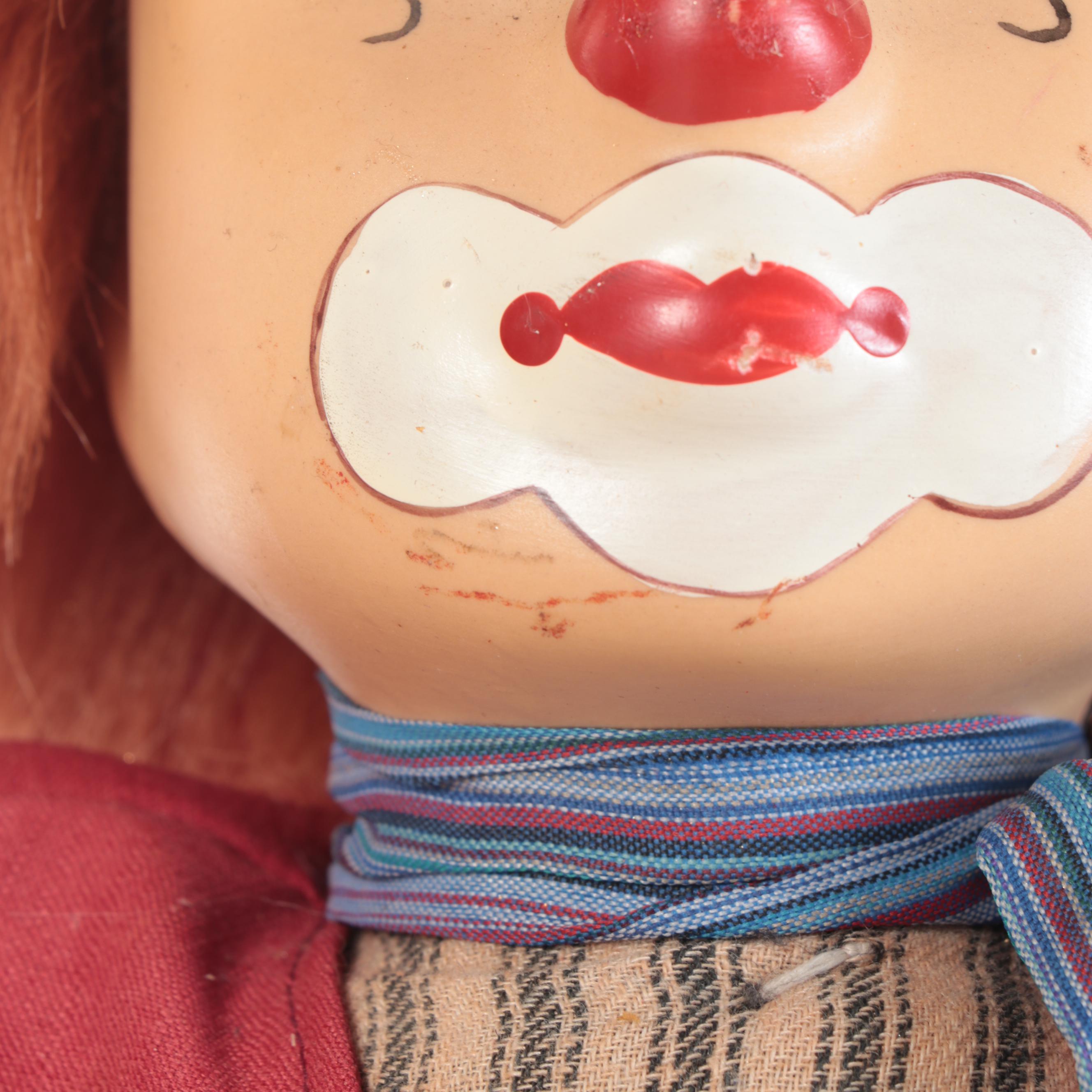 Hand-Painted Porcelain and Cloth Clown Dolls on Swings