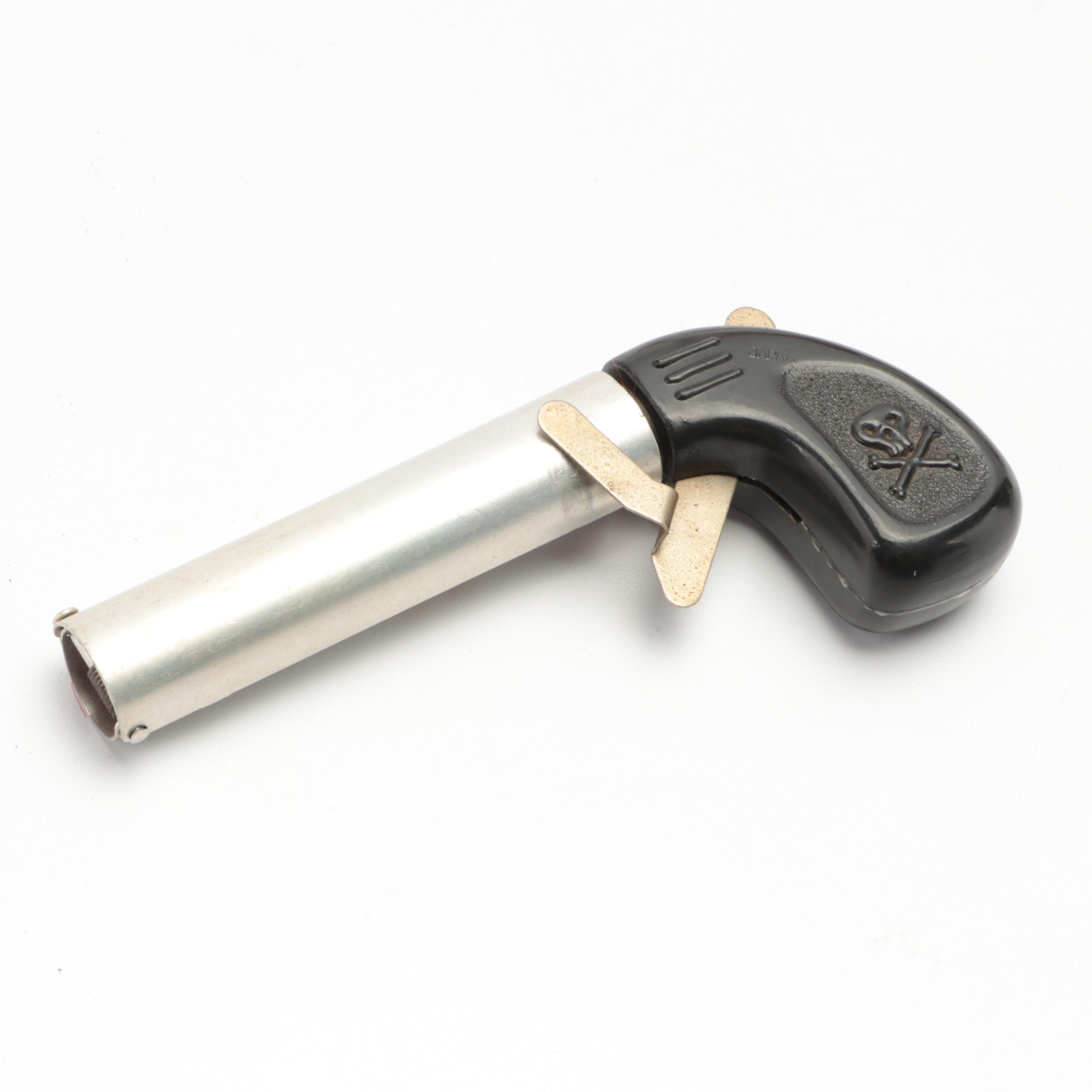 Miniature Cast Iron and Brass Rocking Horses with Prank Gun Toy