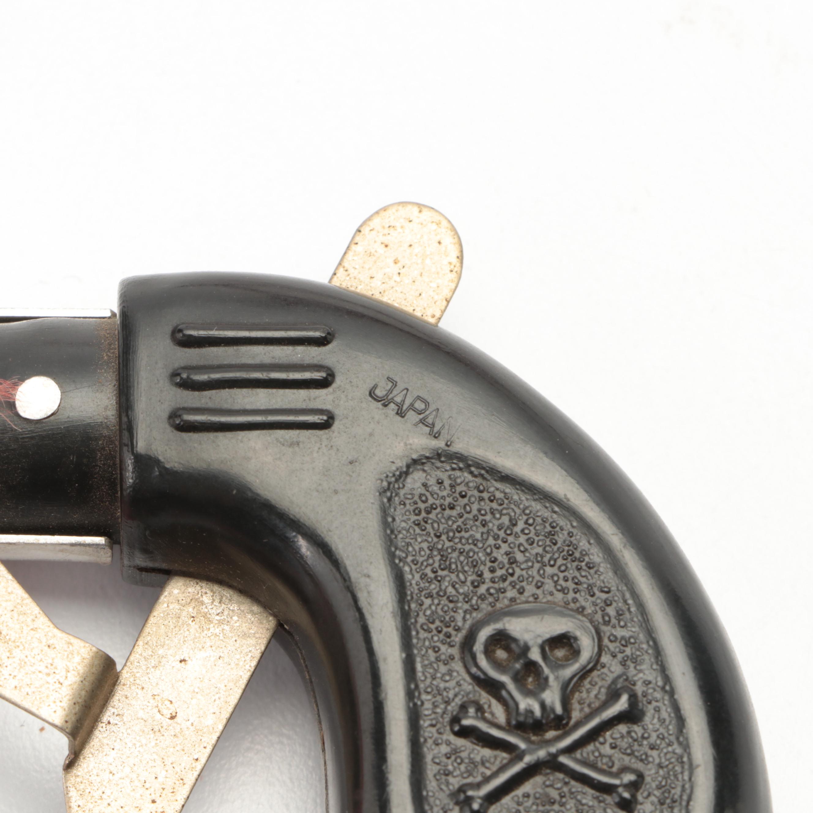 Miniature Cast Iron and Brass Rocking Horses with Prank Gun Toy