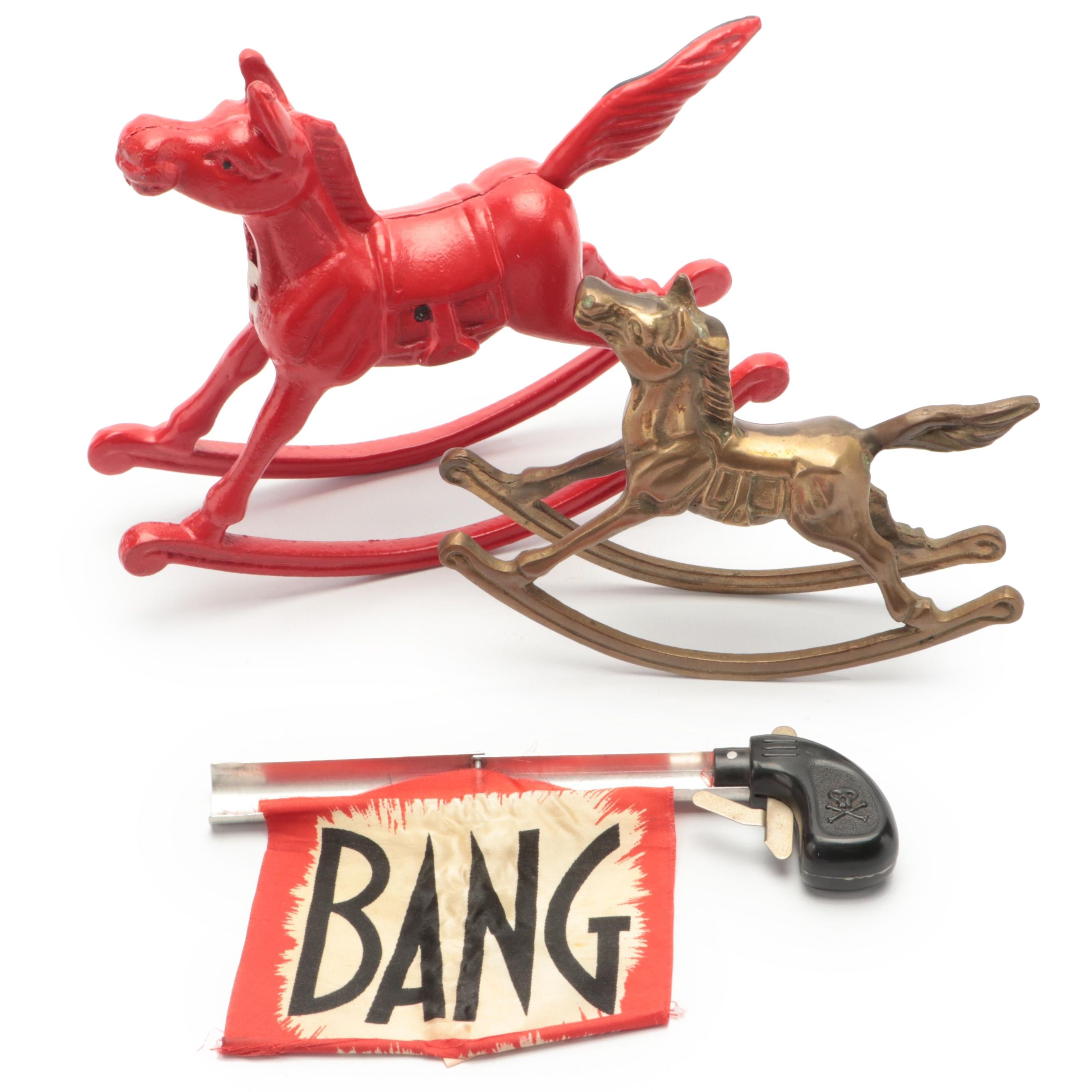 Miniature Cast Iron and Brass Rocking Horses with Prank Gun Toy