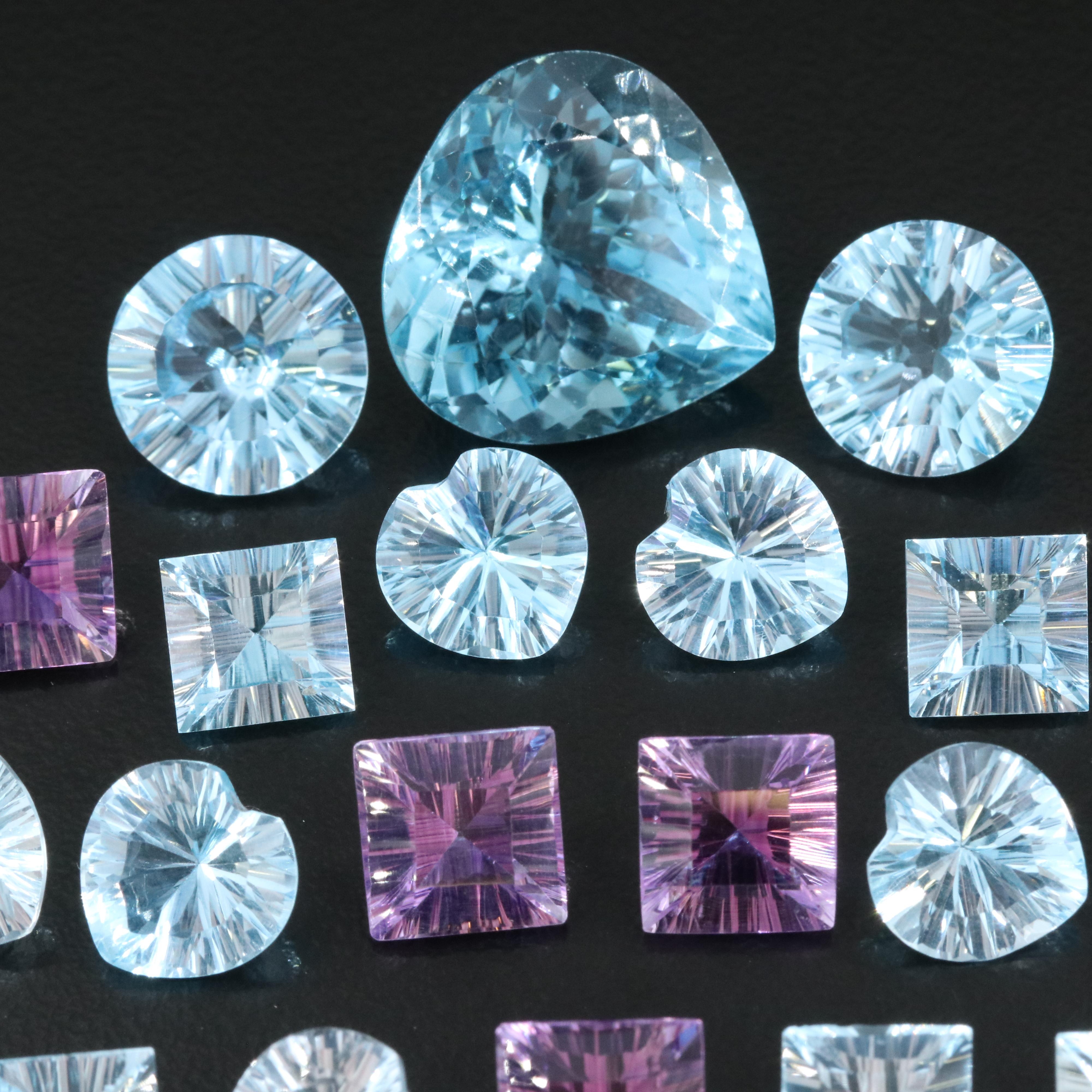 Loose 100.55 CTW Swiss Blue Topaz and Amethyst