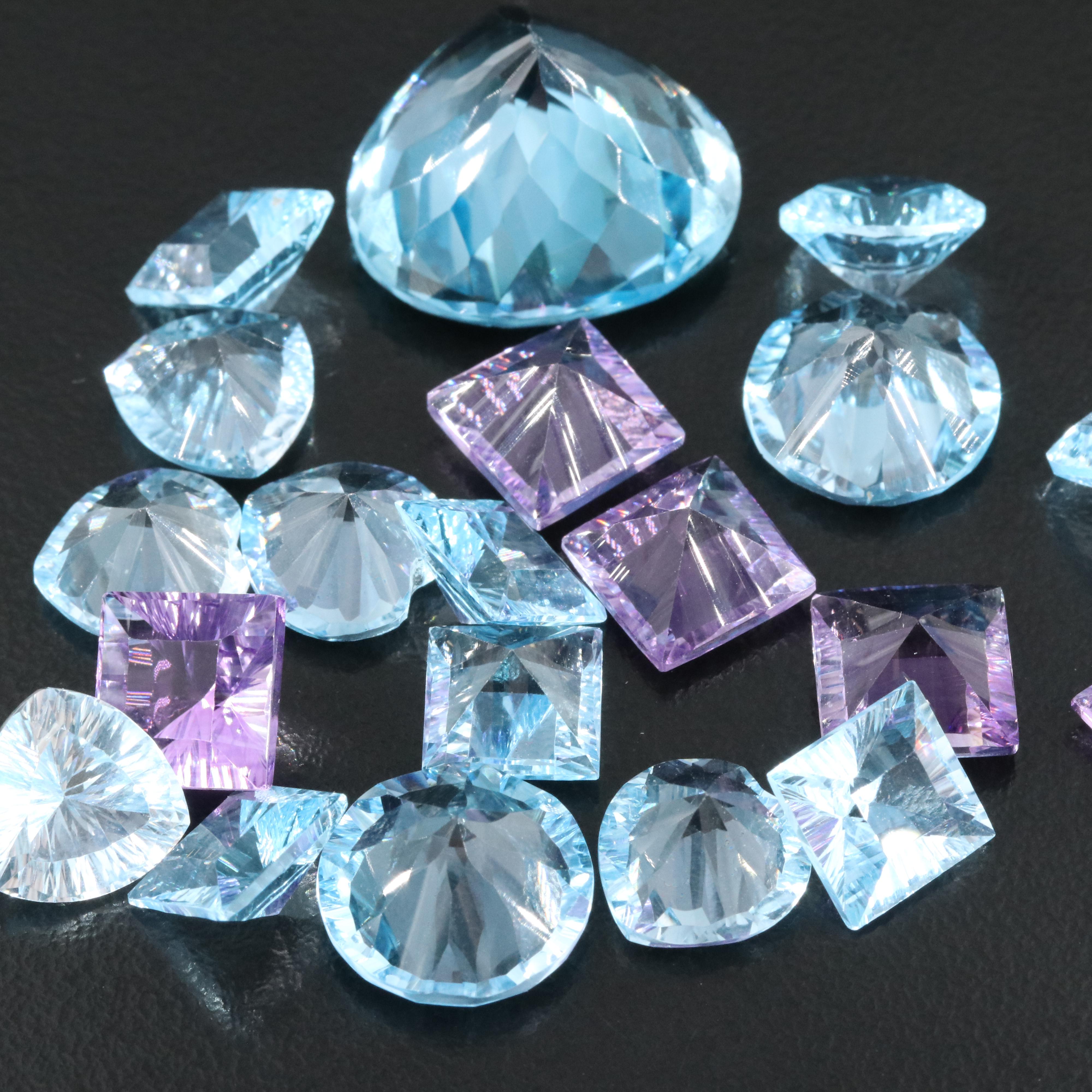 Loose 100.55 CTW Swiss Blue Topaz and Amethyst