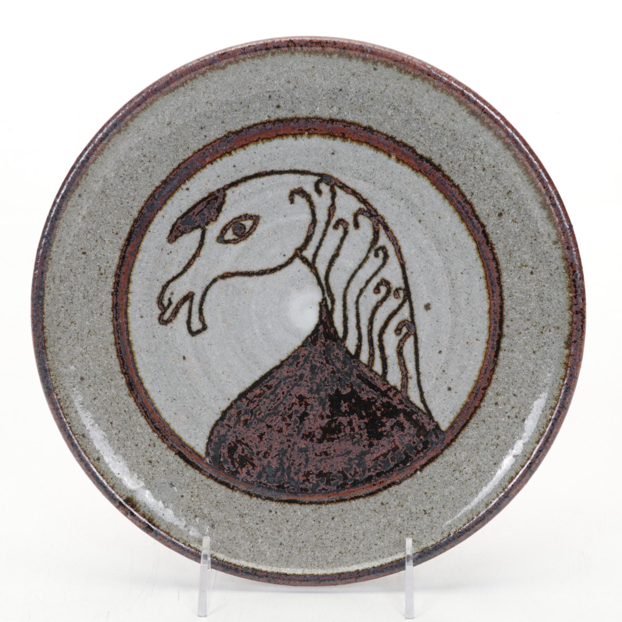 Menorah, Goblet, Studio Pottery Plate, and Jewish History Books