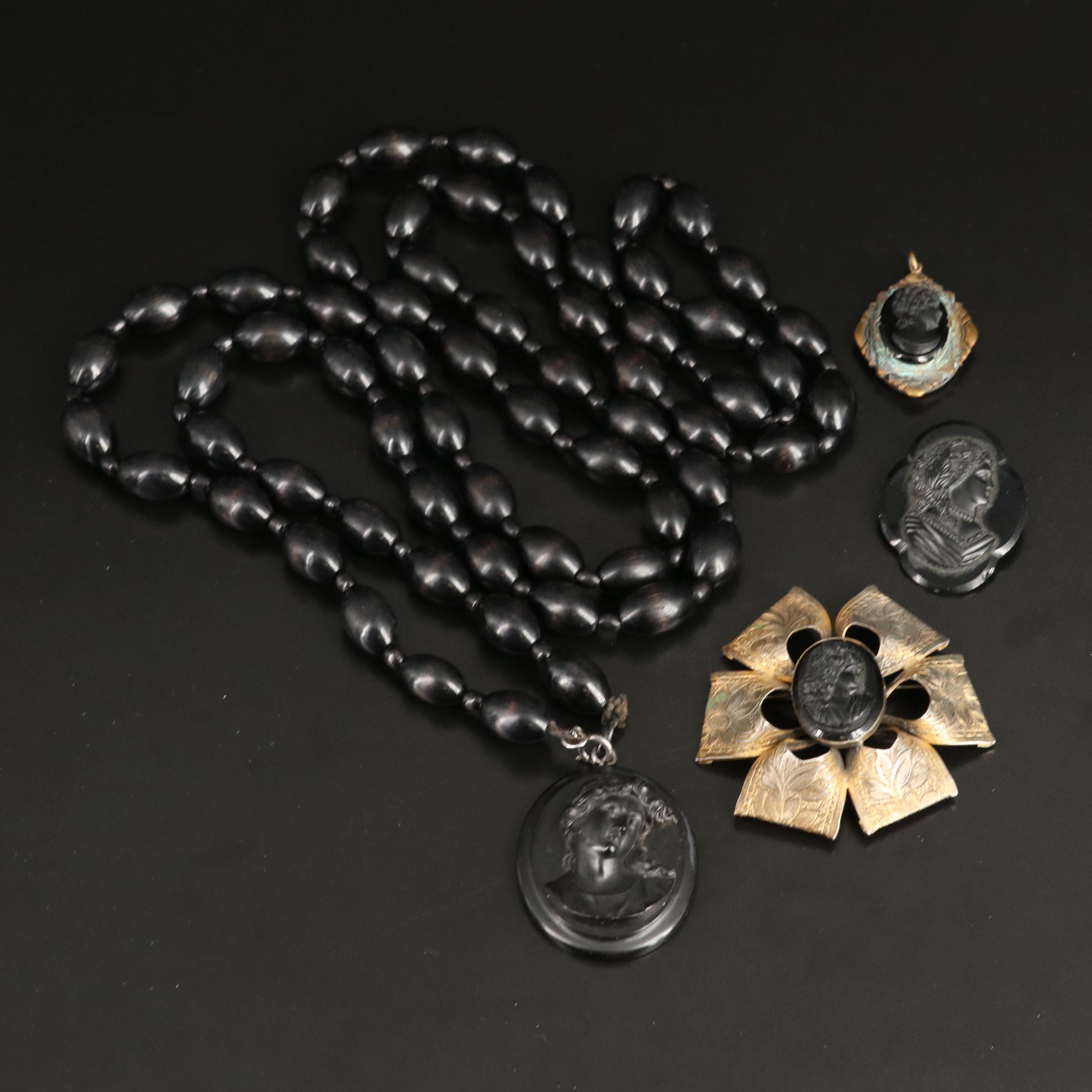 Vintage Grouping Including Vulcanite, Glass and Wood