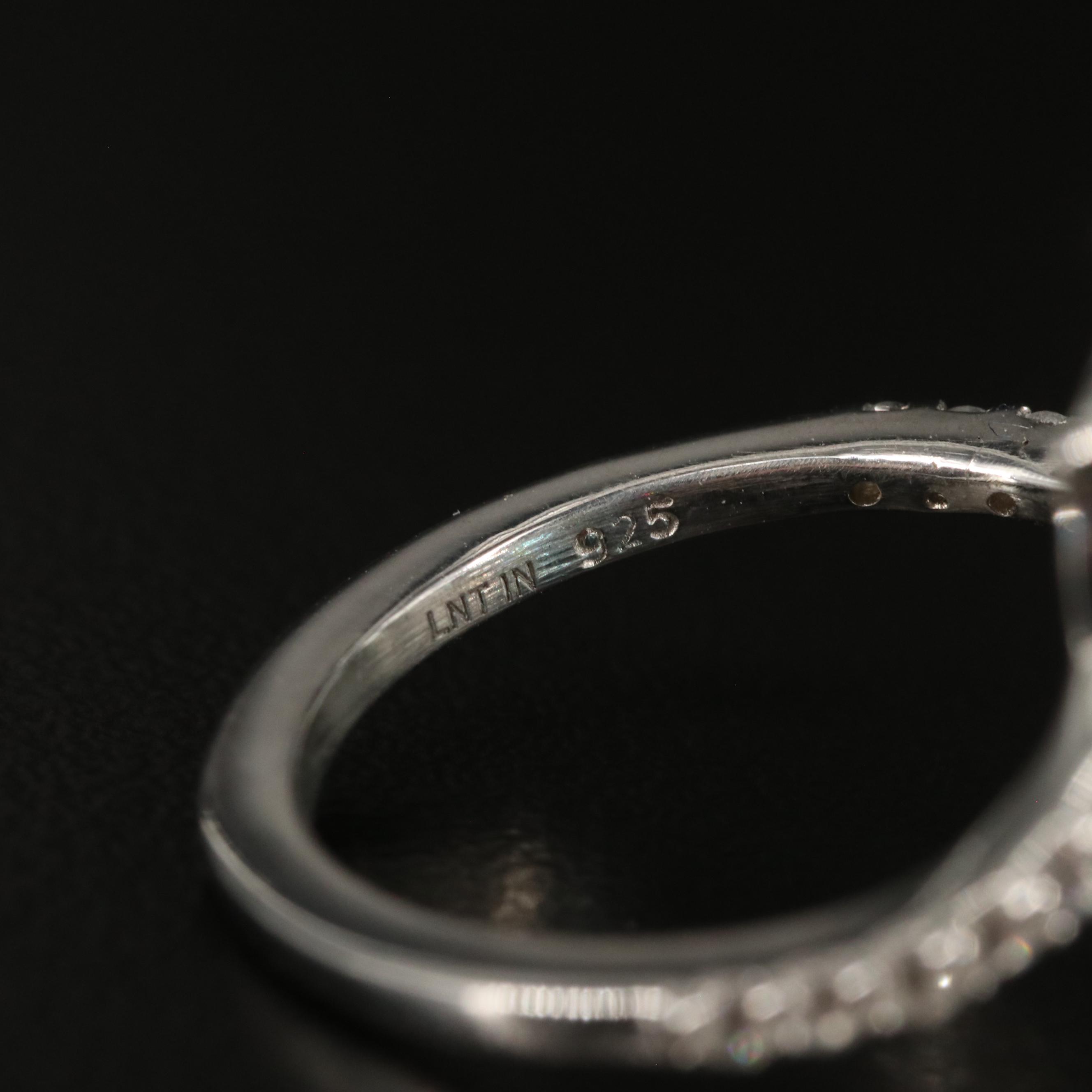 Sterling Blue Topaz and White Topaz Bypass Ring