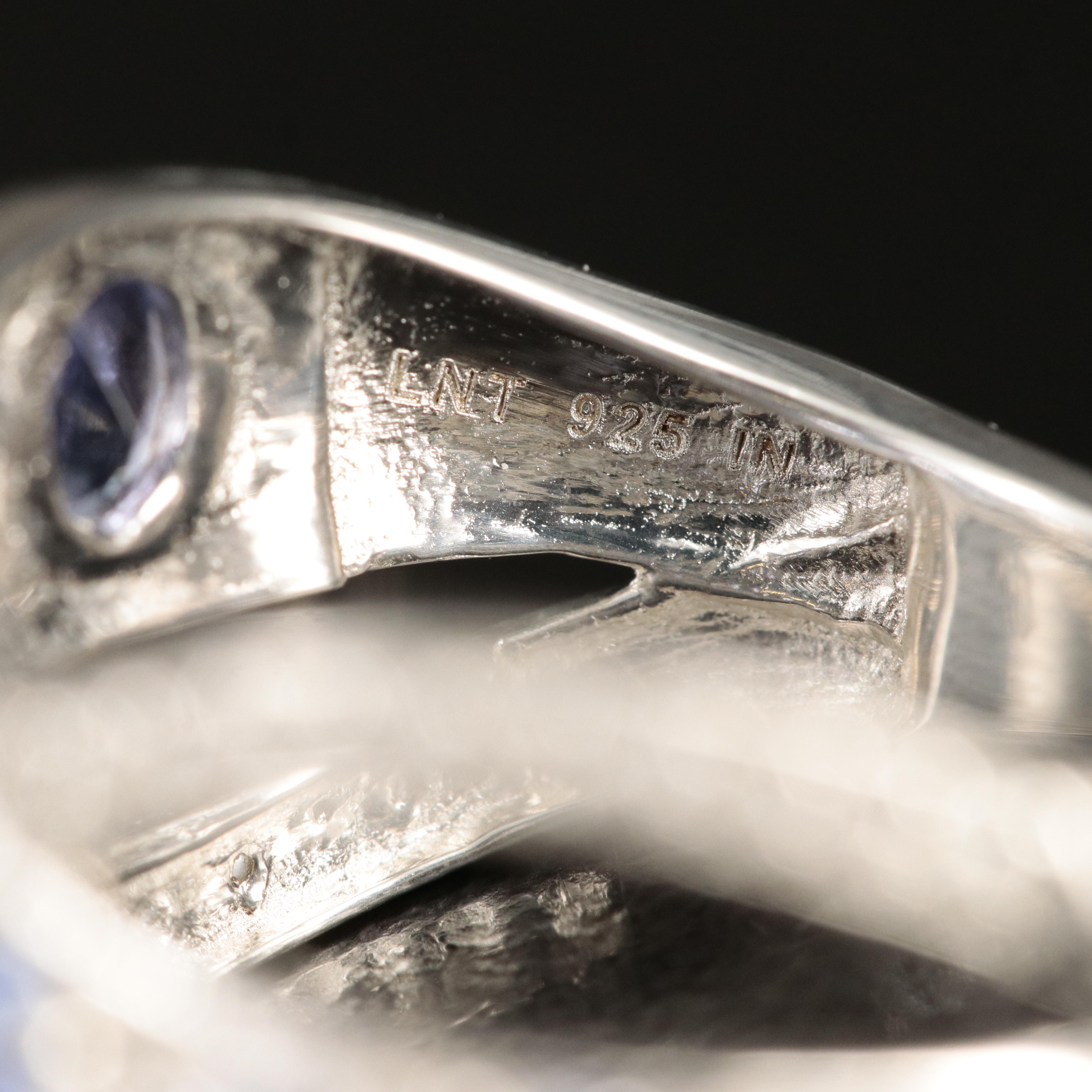 Sterling Tanzanite and White Zircon Crossover Ring