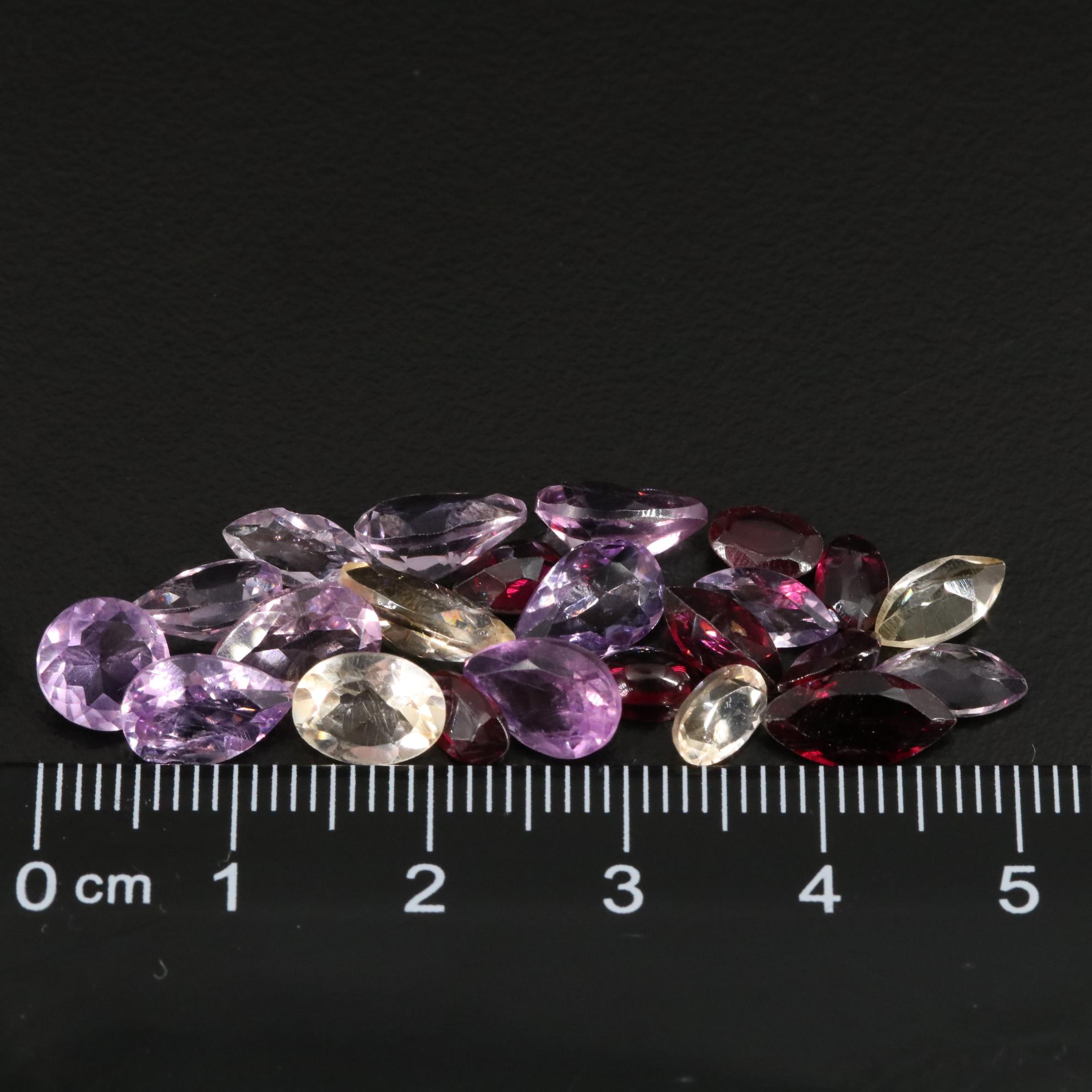 Loose 18.10 CTW Amethyst, Garnet, and Citrine Lot