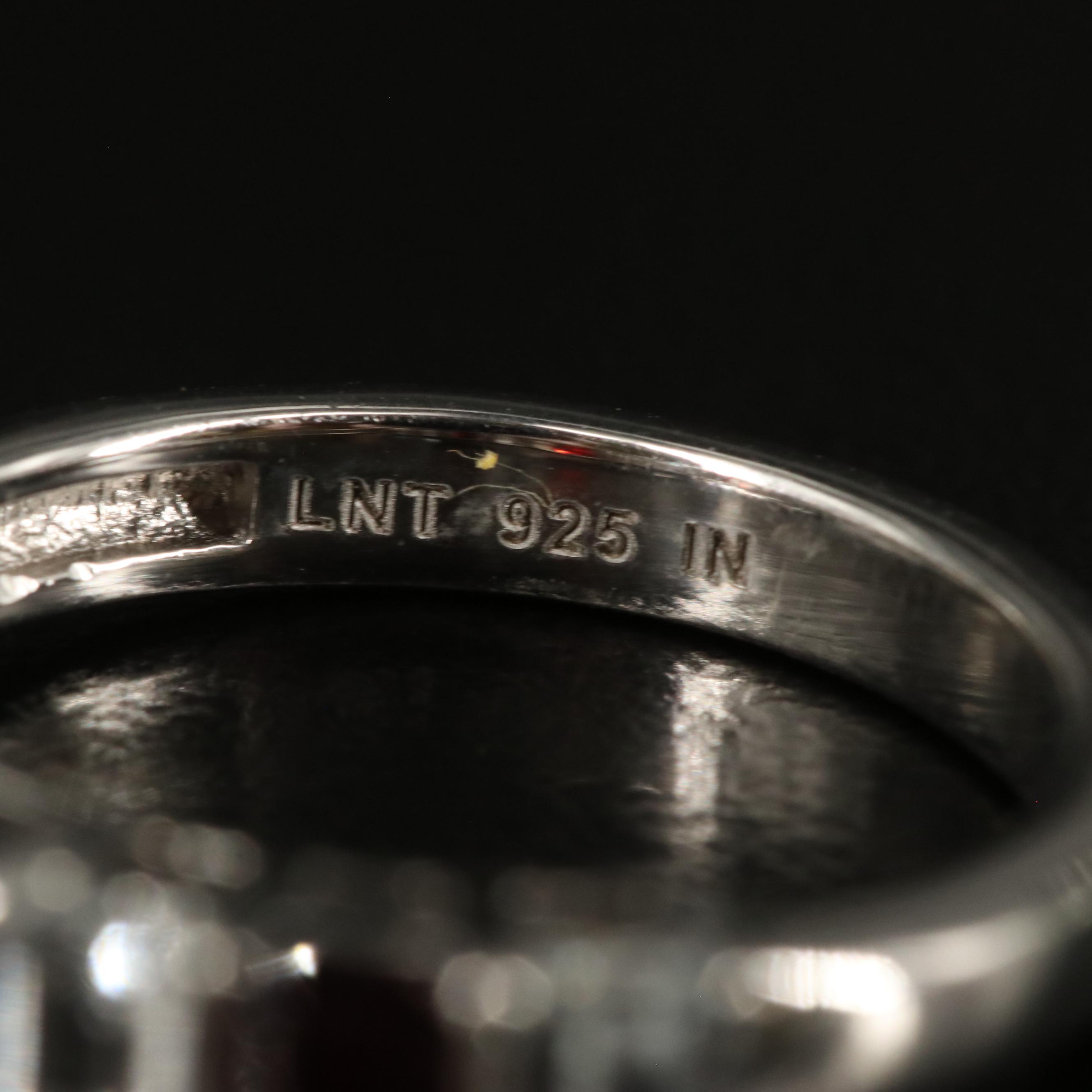 Sterling Garnet and White Topaz Ring