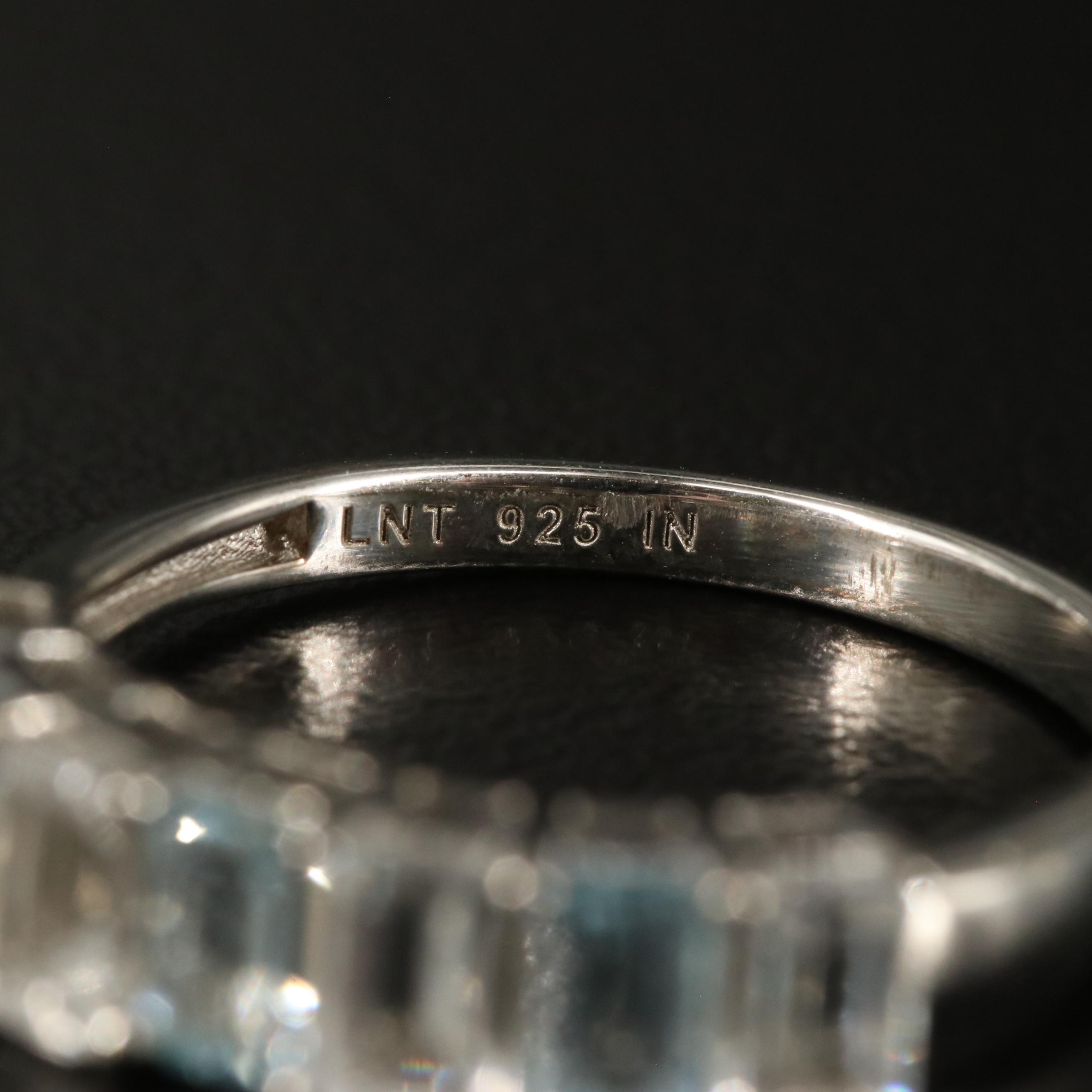 Sterling Blue and White Topaz Band