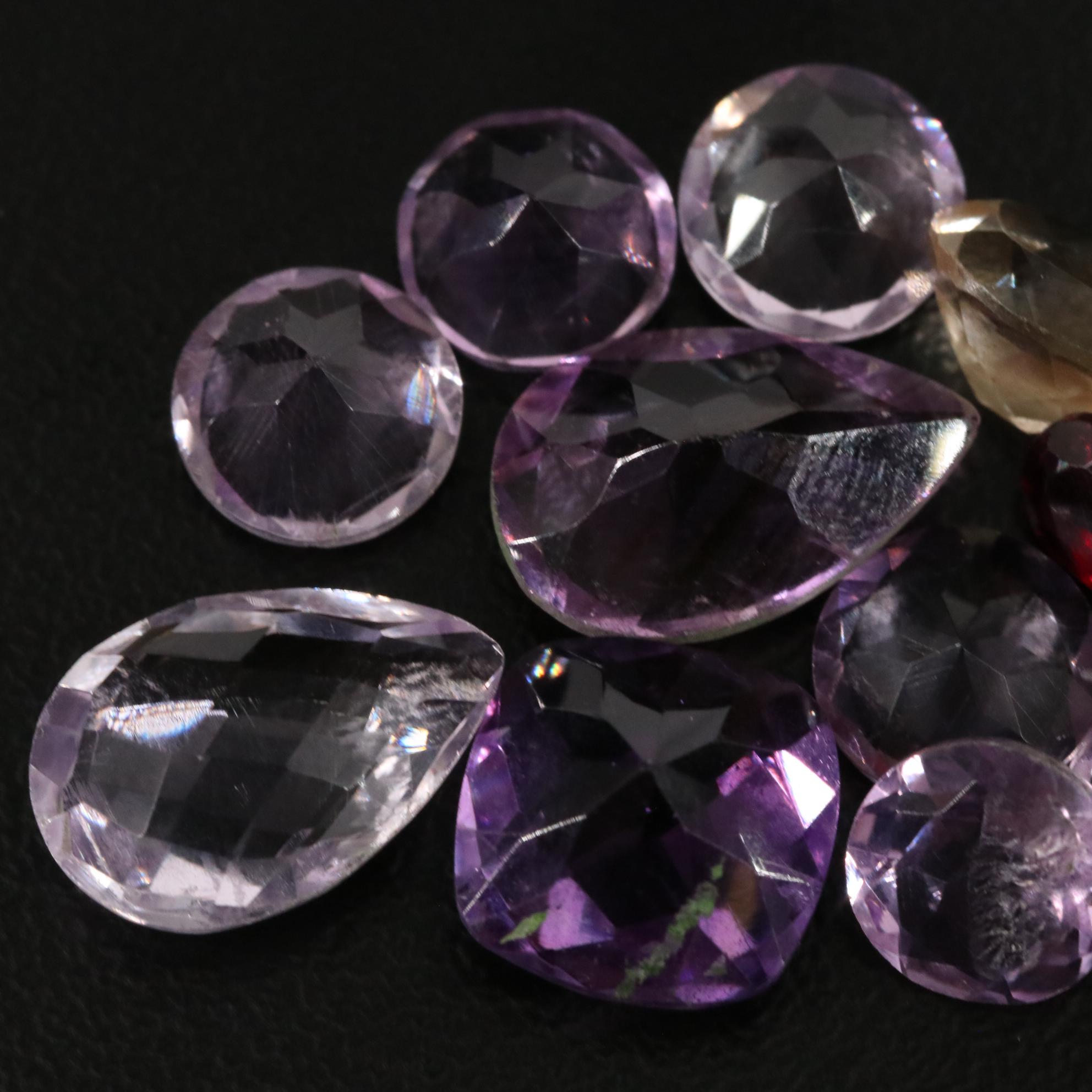 Loose 24.60 CTW Amethyst, Garnet, and Citrine Lot