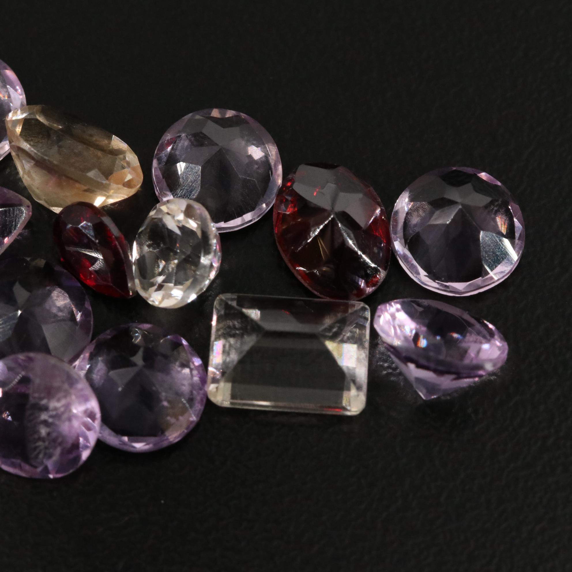 Loose 24.60 CTW Amethyst, Garnet, and Citrine Lot