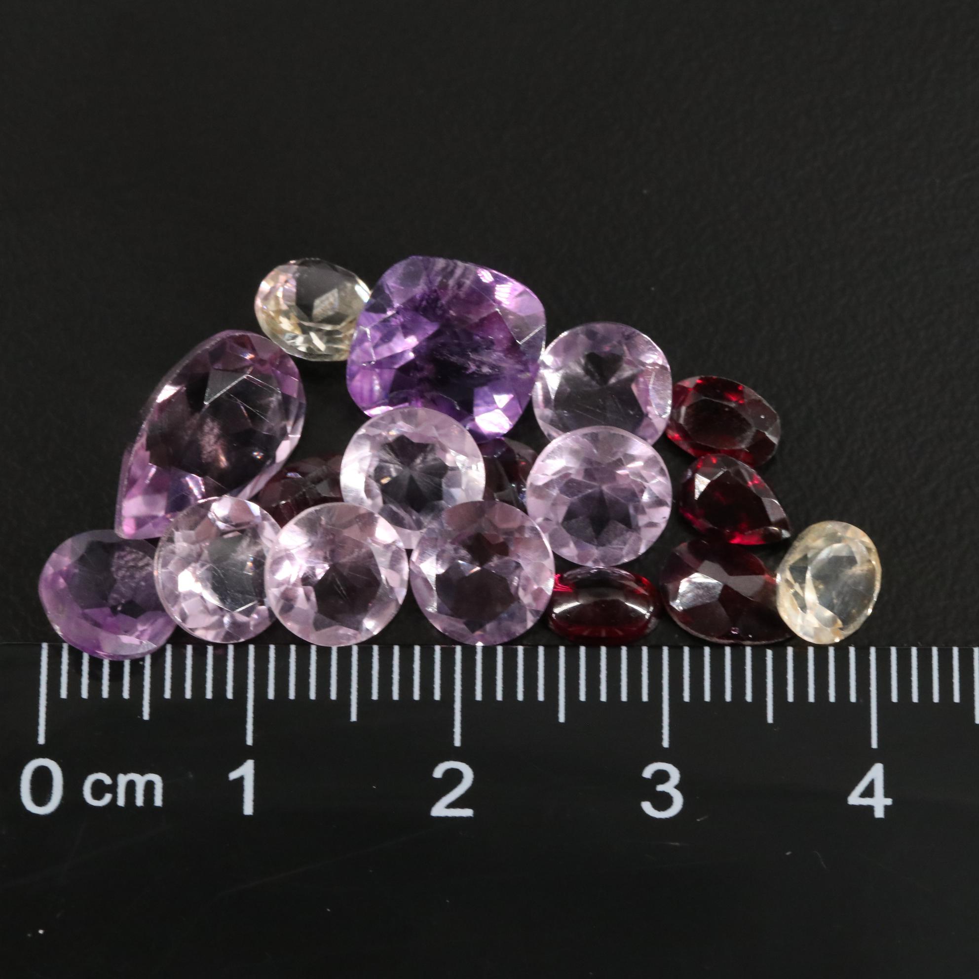 Loose 18.67 CTW Amethyst, Garnet, and Citrine Lot