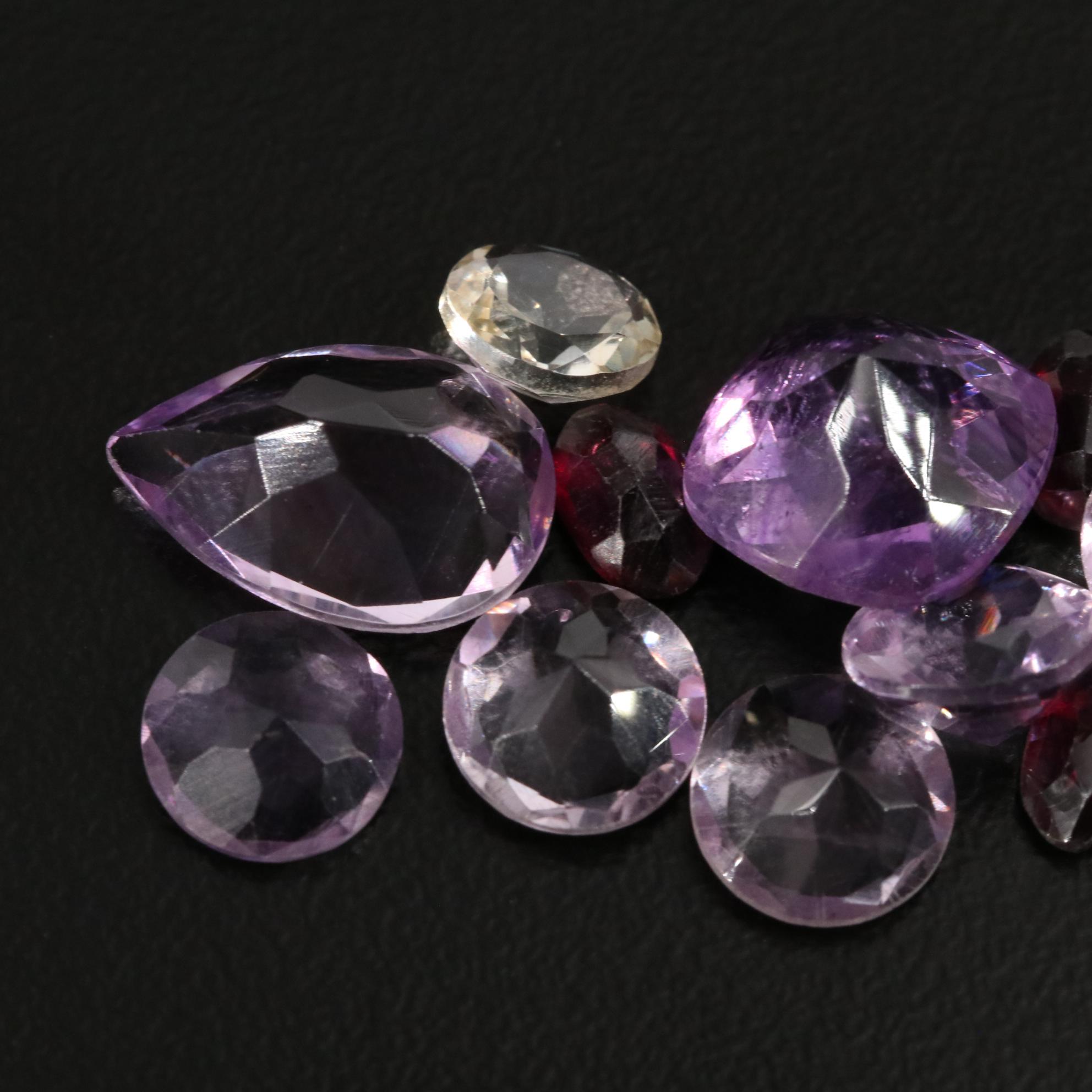 Loose 18.67 CTW Amethyst, Garnet, and Citrine Lot