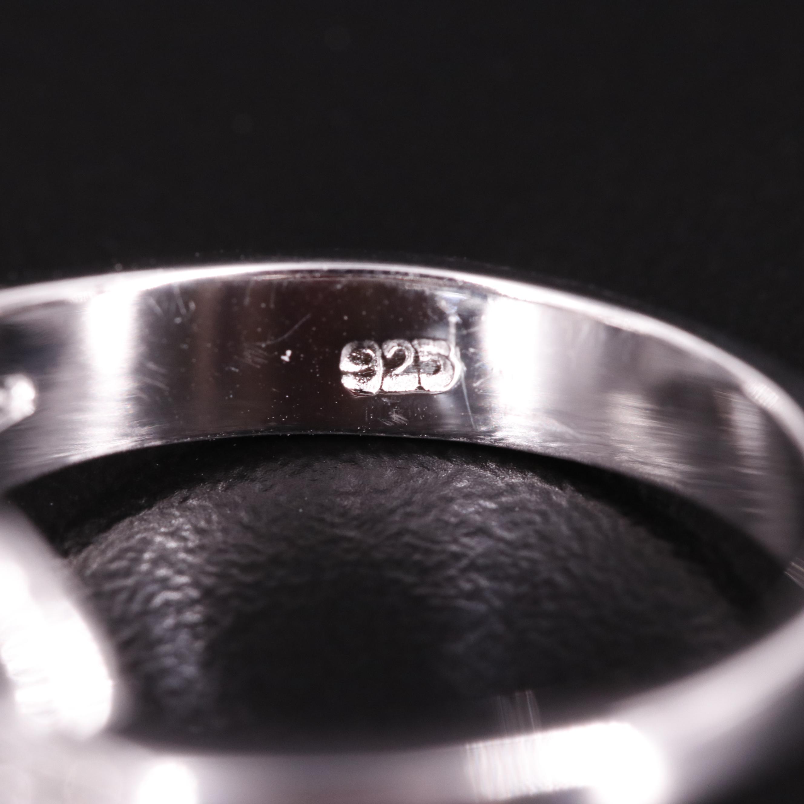 Sterling Blue Topaz and Diamond Ring