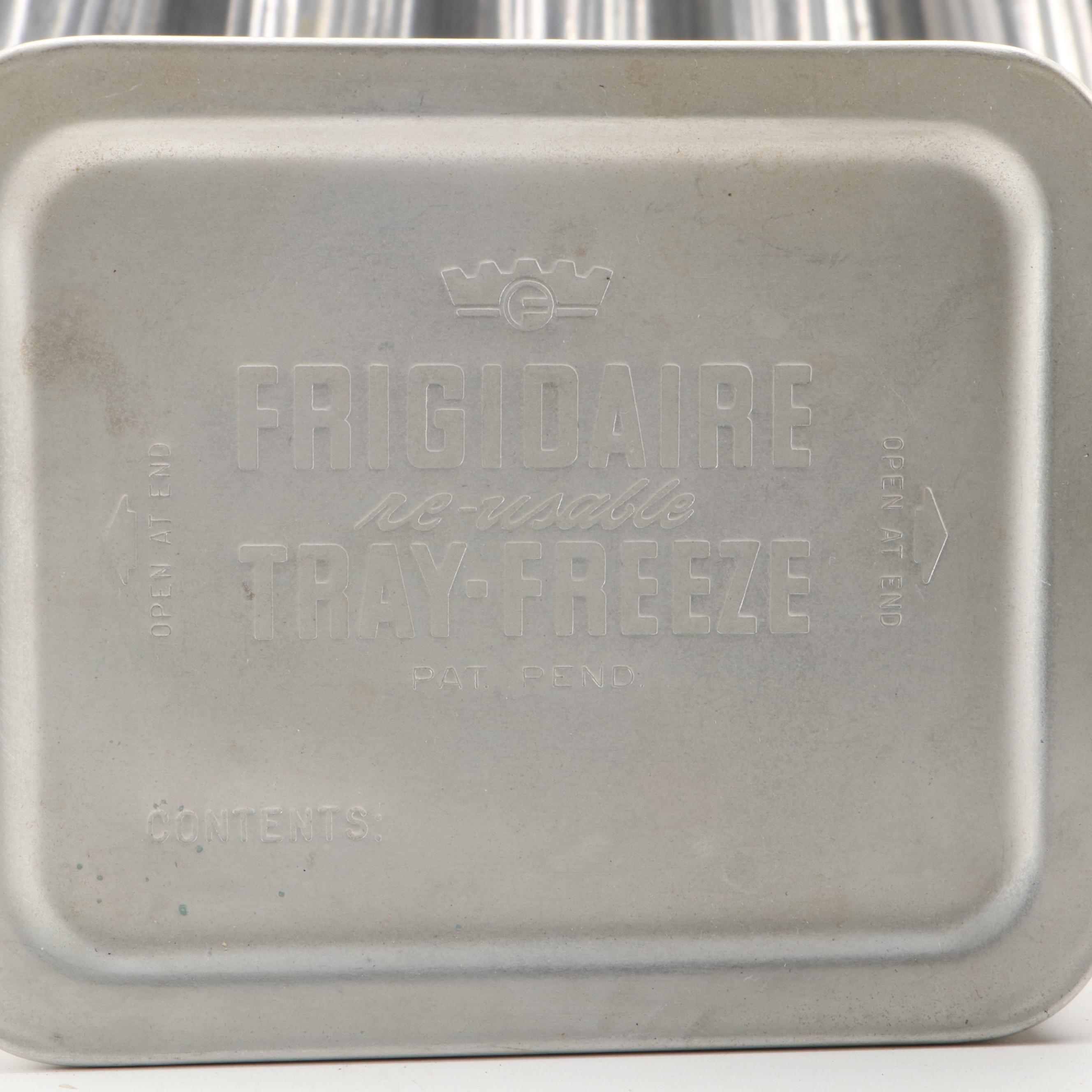 Griswold and Other Cast Iron Pans with Blue Bird Pie Pans and Other Kitchenware