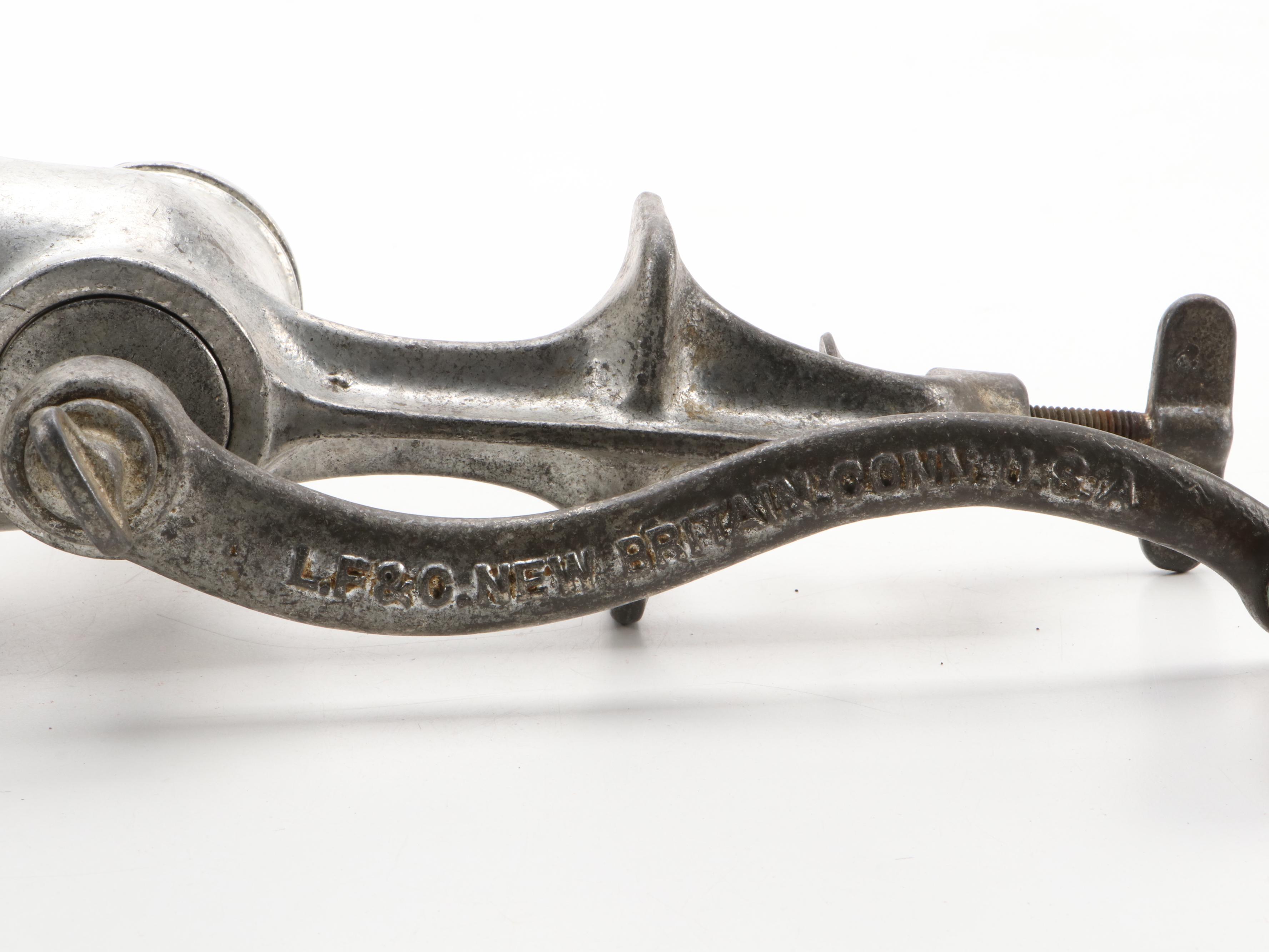 Griswold and Other Cast Iron Pans with Blue Bird Pie Pans and Other Kitchenware