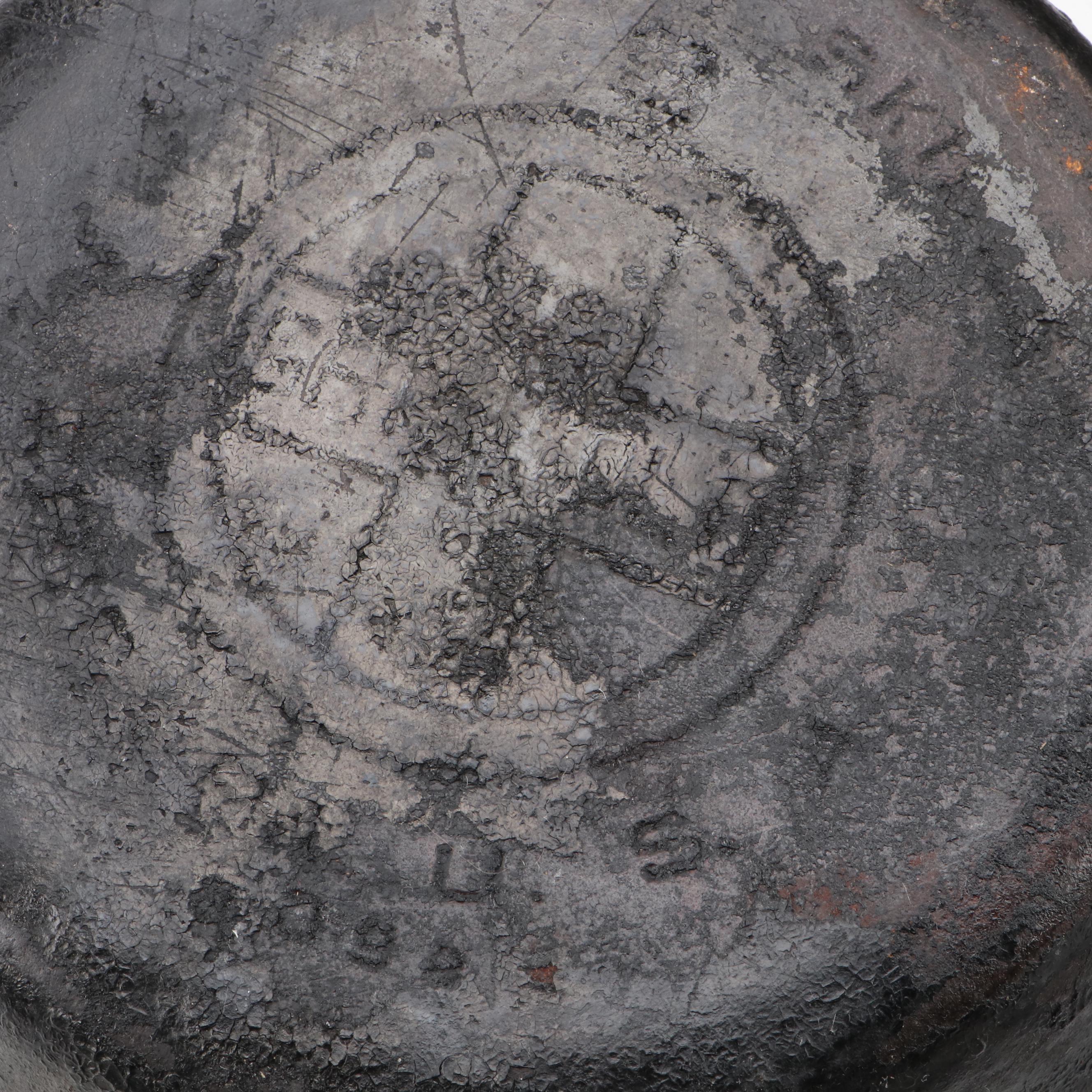 Griswold and Other Cast Iron Pans with Blue Bird Pie Pans and Other Kitchenware