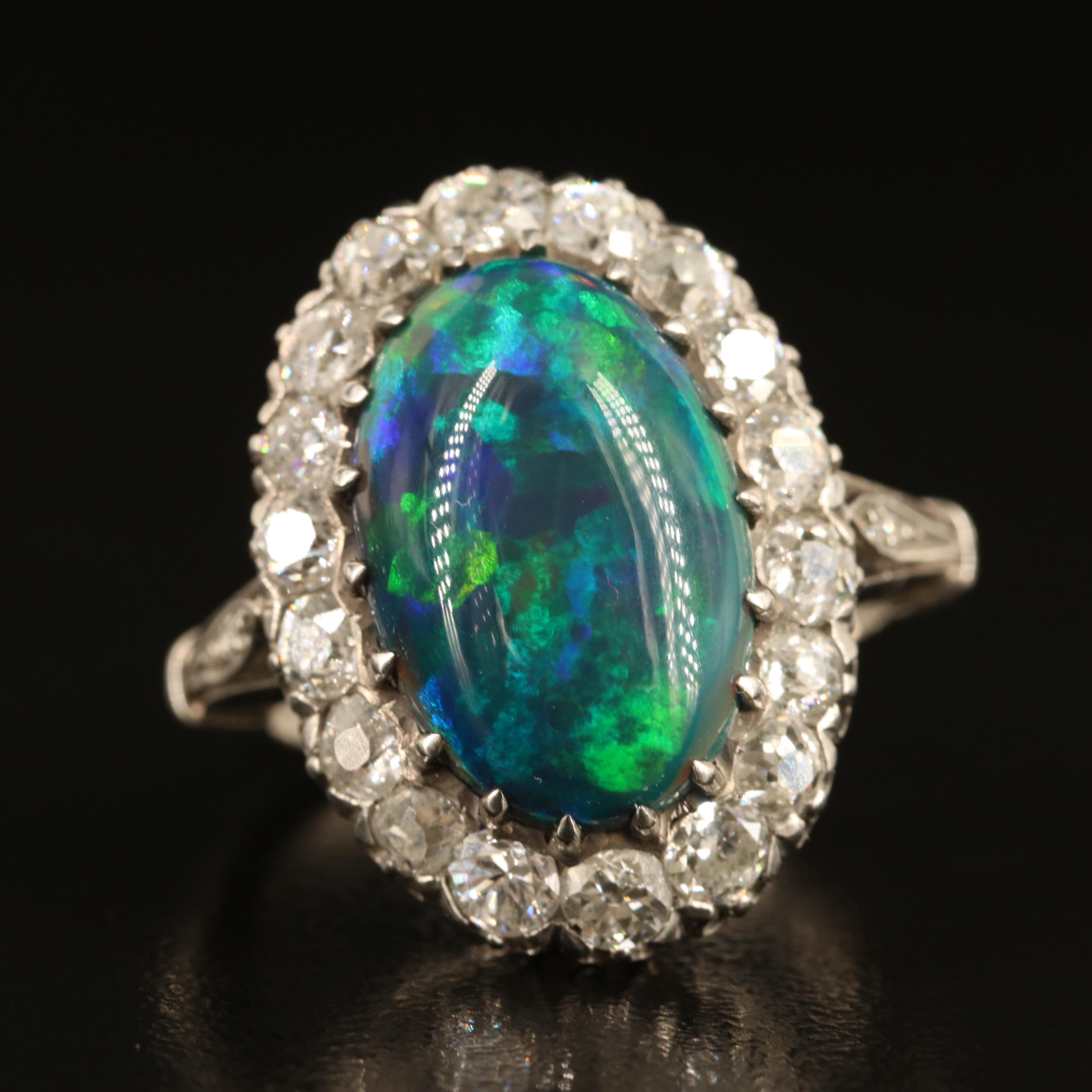 Antique Platinum Opal and 1.42 CTW Diamond Halo Ring