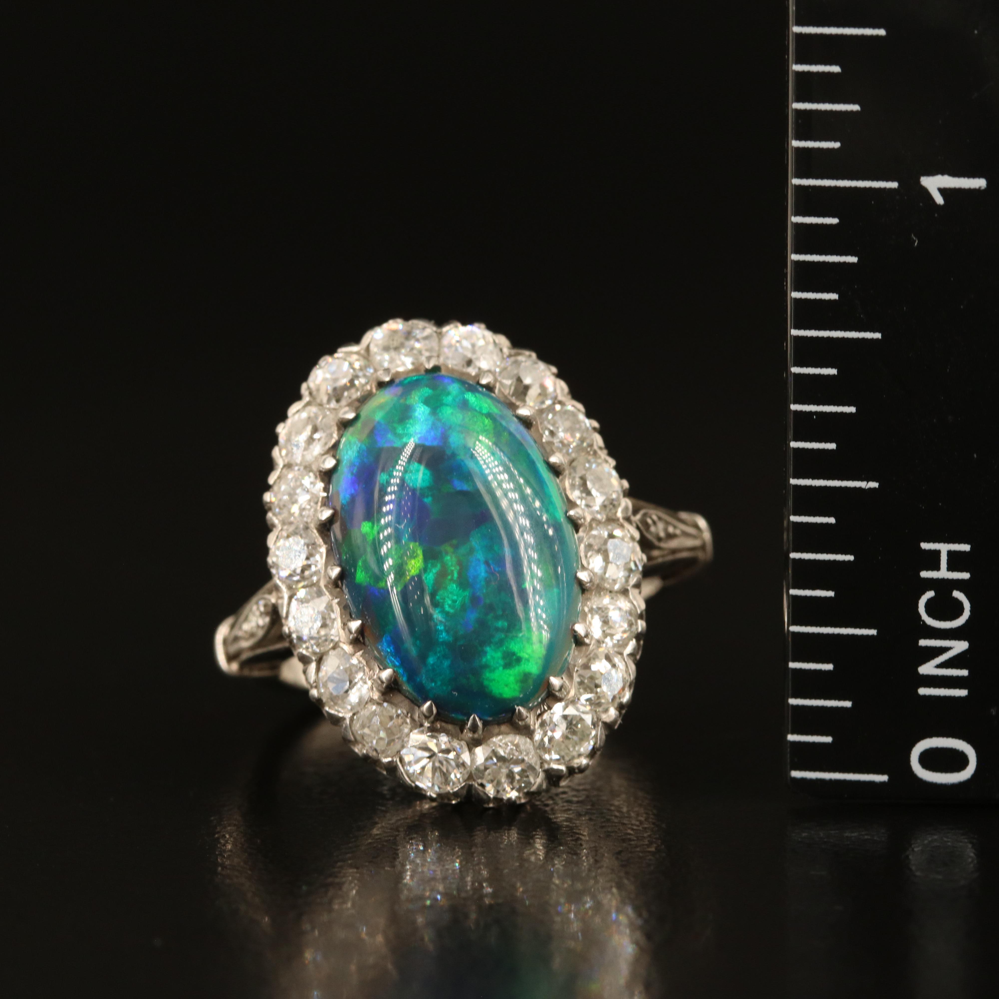 Antique Platinum Opal and 1.42 CTW Diamond Halo Ring