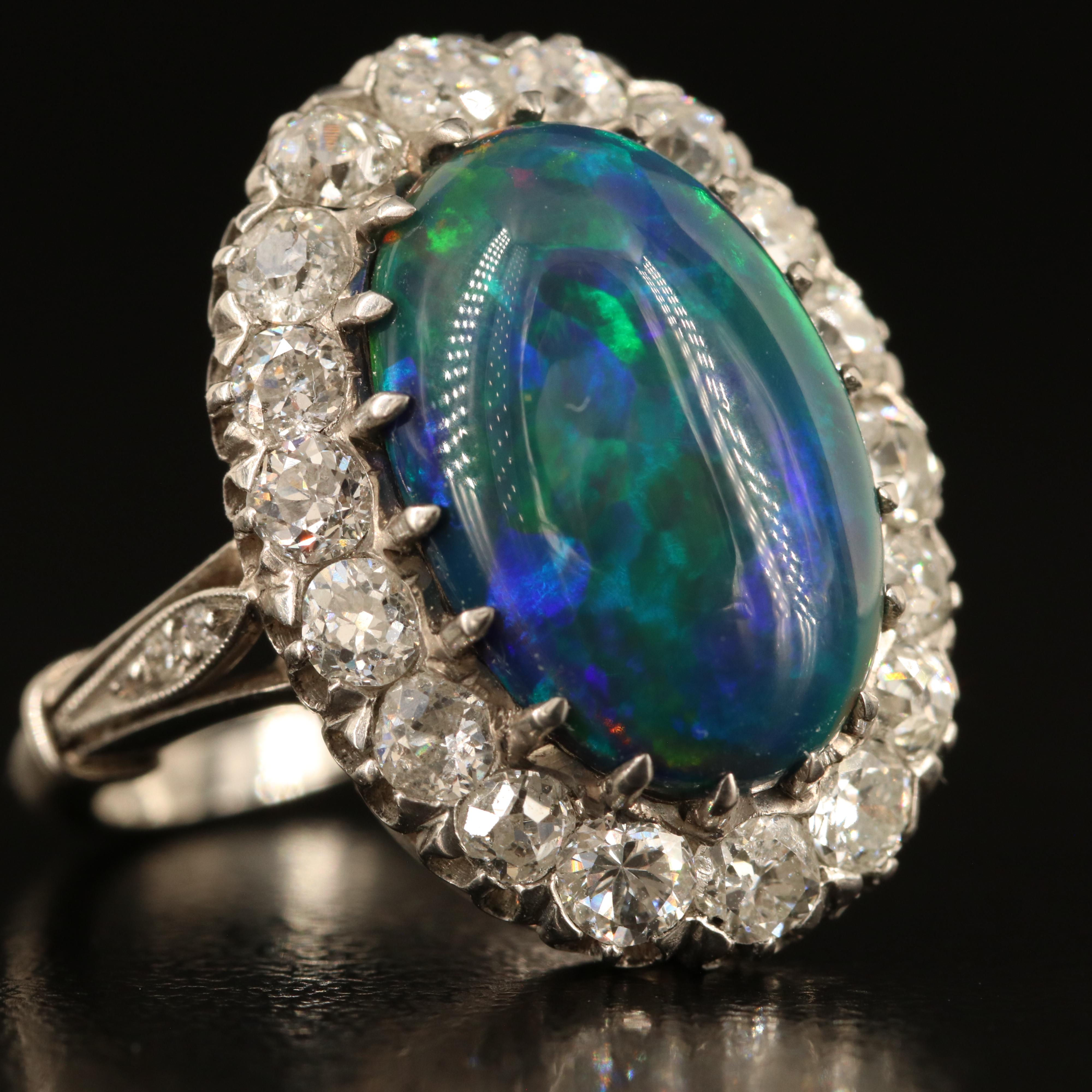 Antique Platinum Opal and 1.42 CTW Diamond Halo Ring