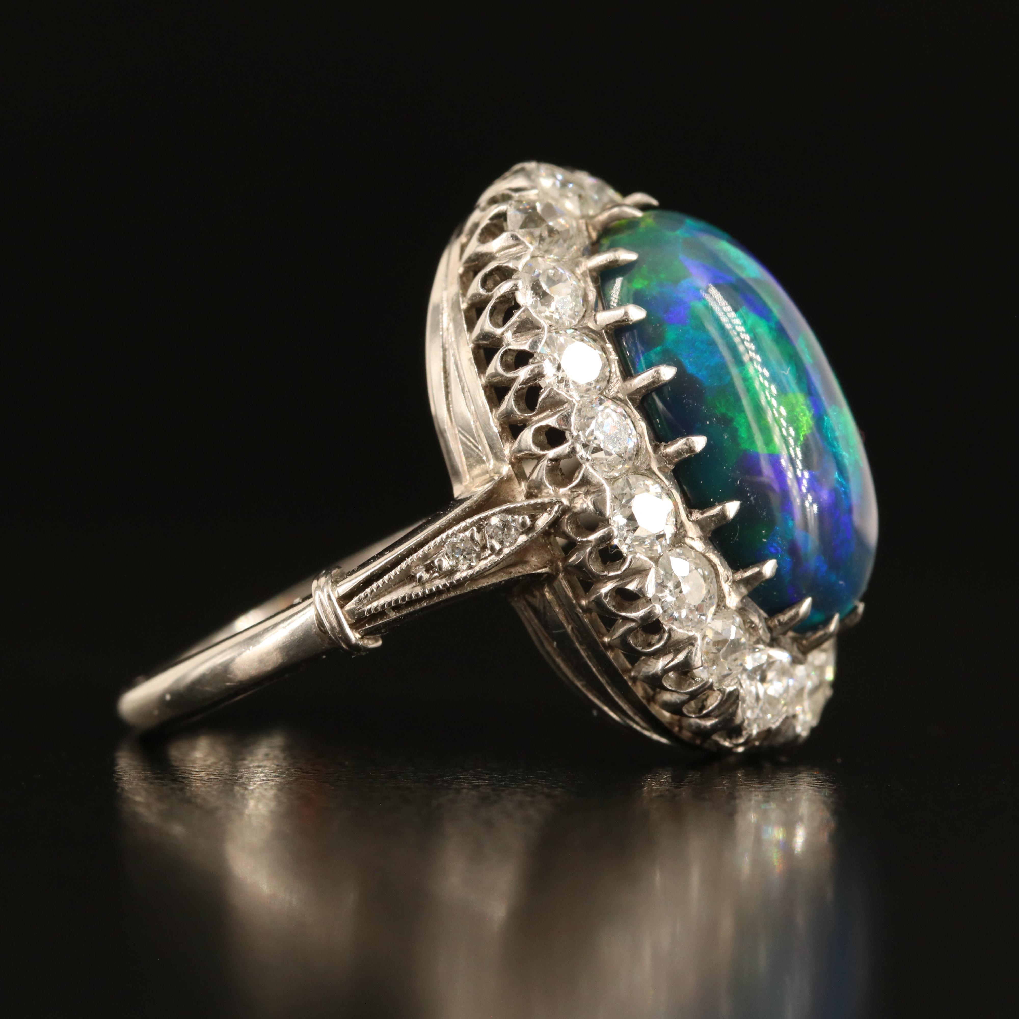 Antique Platinum Opal and 1.42 CTW Diamond Halo Ring
