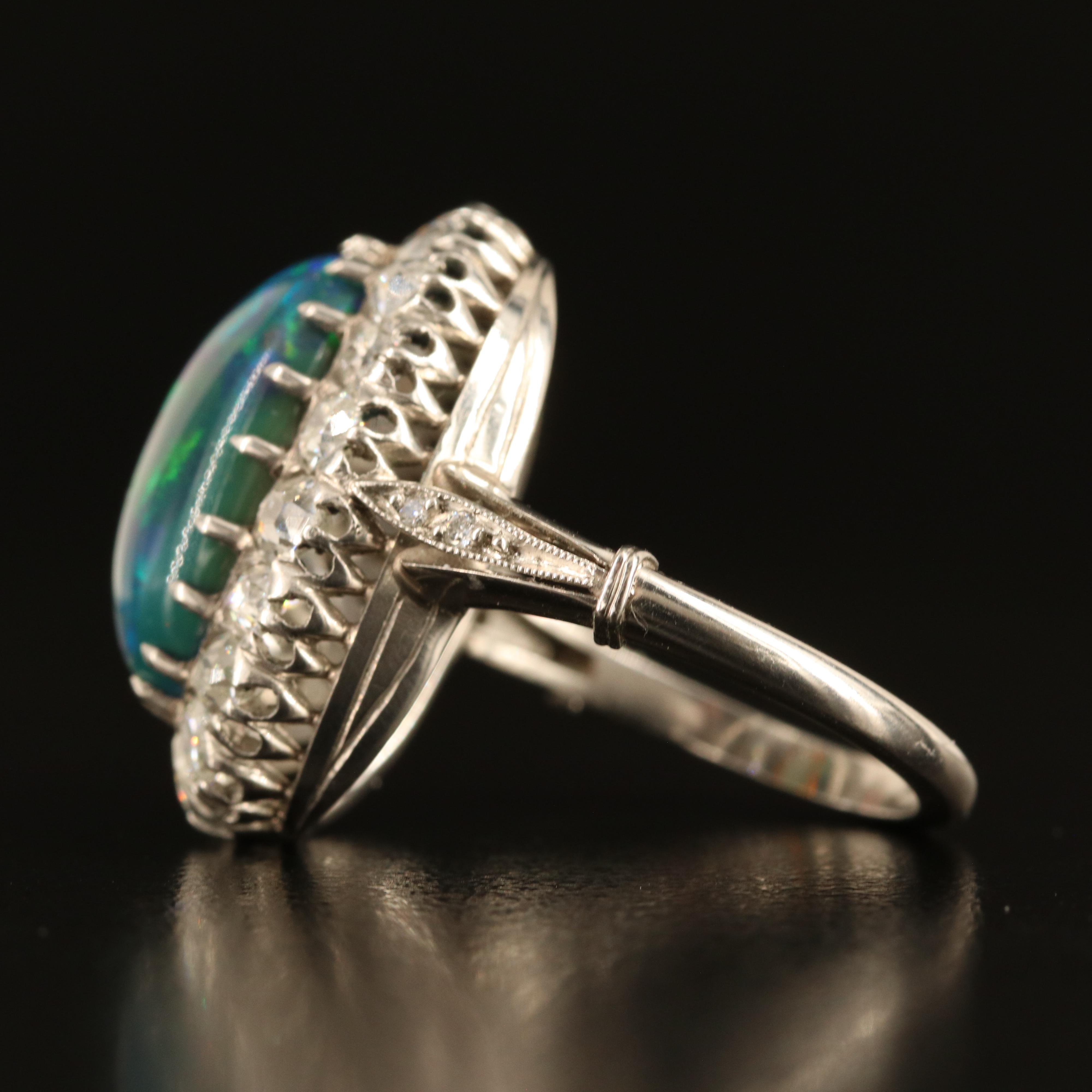 Antique Platinum Opal and 1.42 CTW Diamond Halo Ring