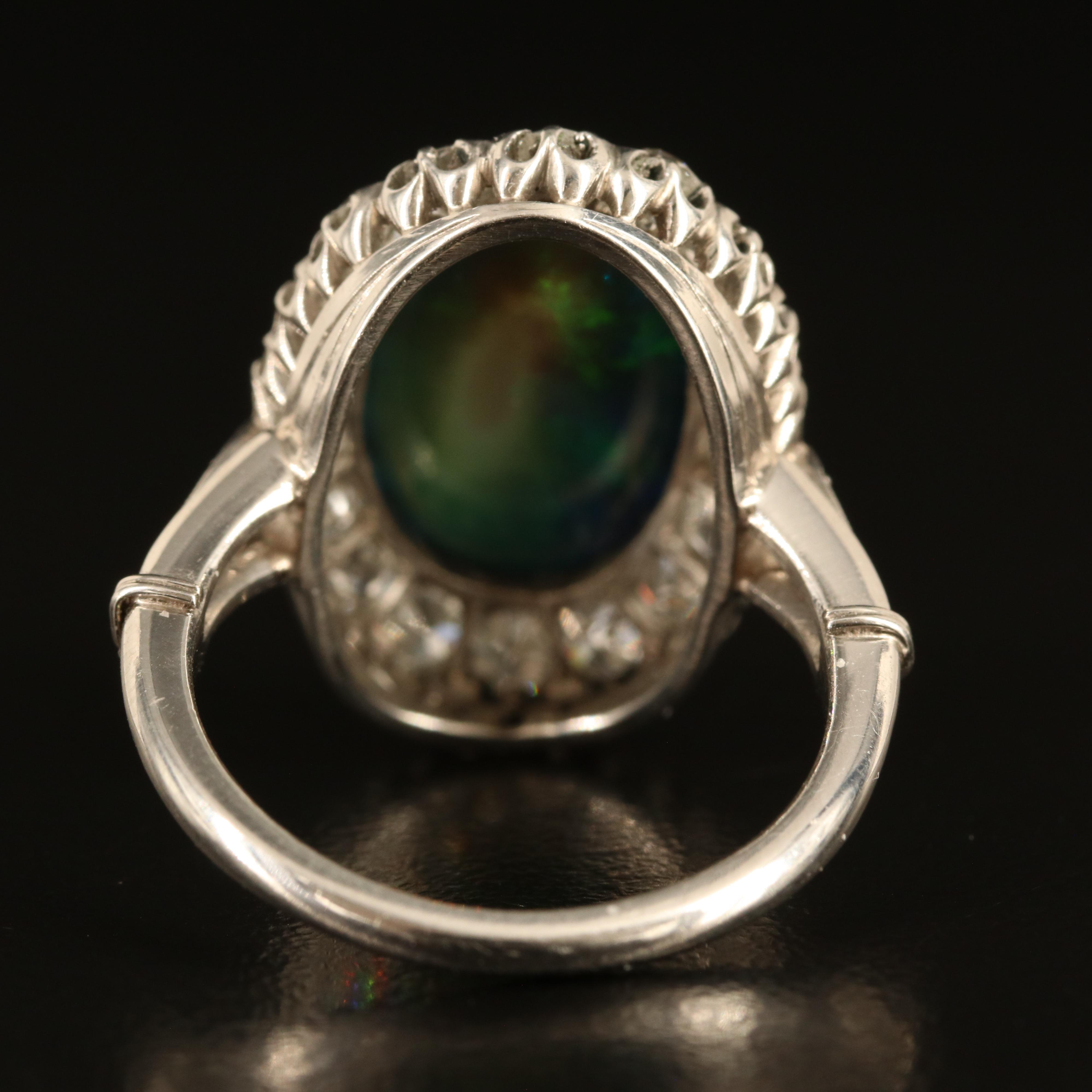 Antique Platinum Opal and 1.42 CTW Diamond Halo Ring