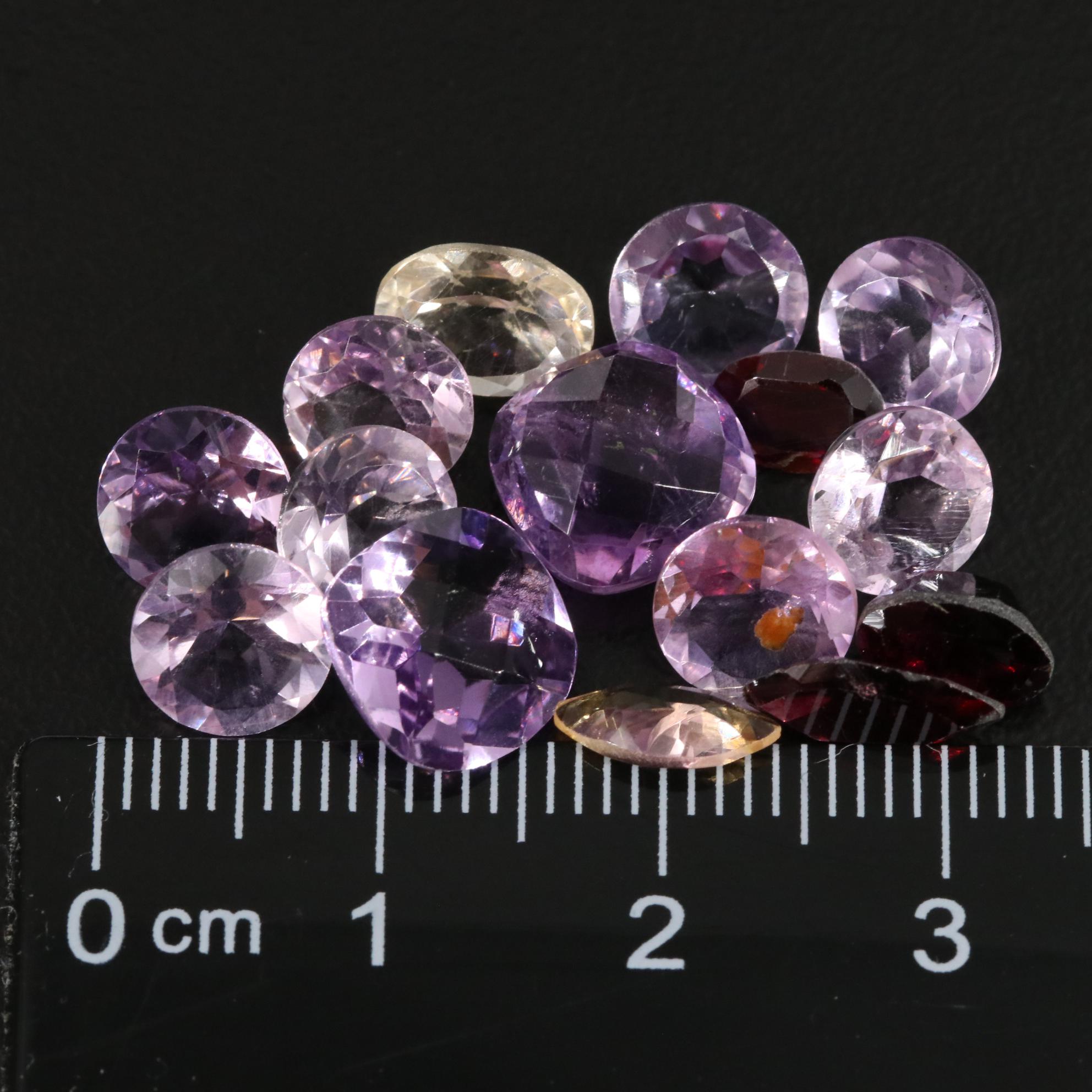 Loose 18.42 CTW Amethyst, Citrine, and Garnet Lot