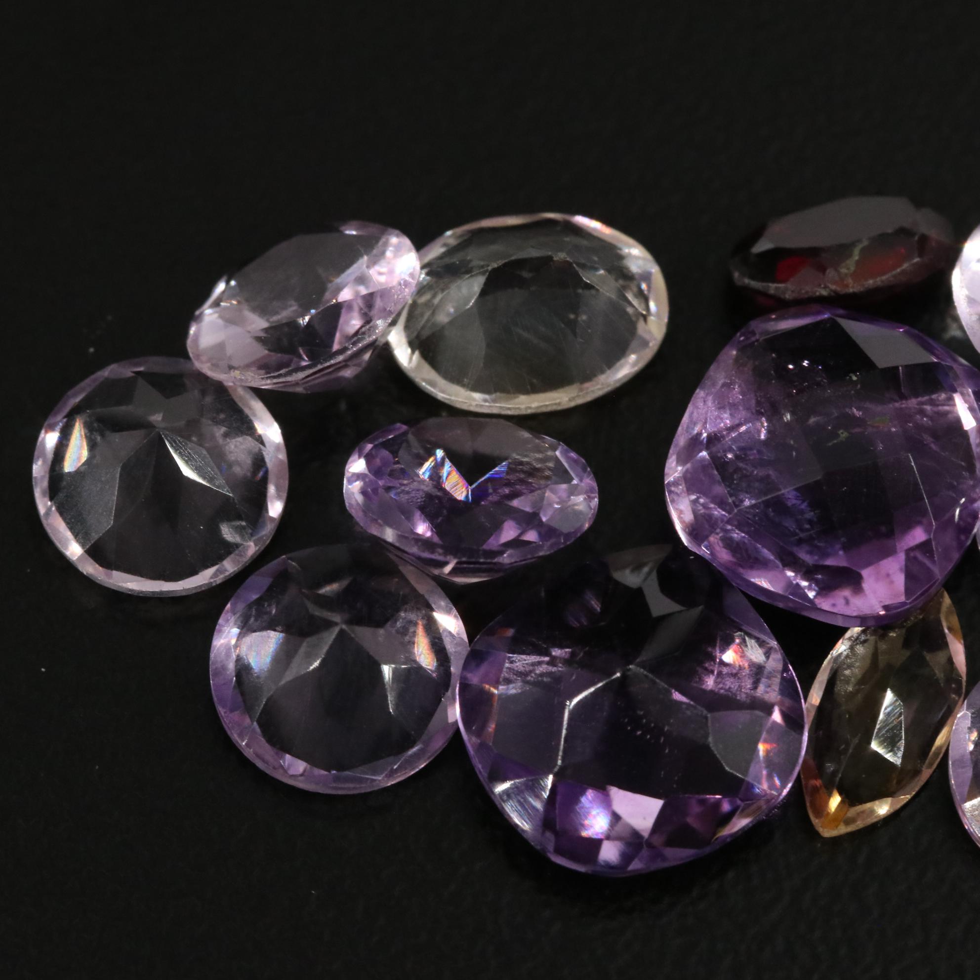 Loose 18.42 CTW Amethyst, Citrine, and Garnet Lot