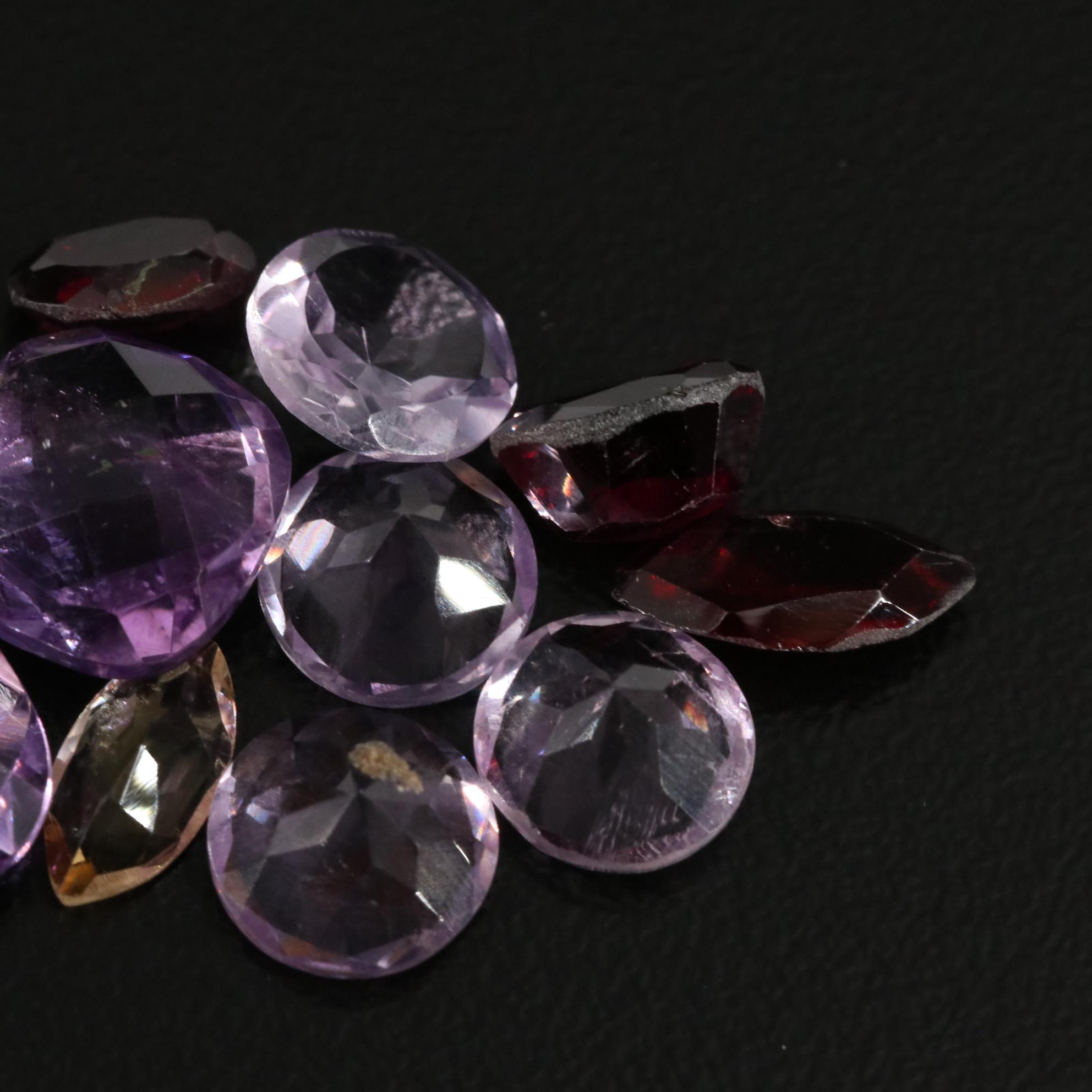 Loose 18.42 CTW Amethyst, Citrine, and Garnet Lot