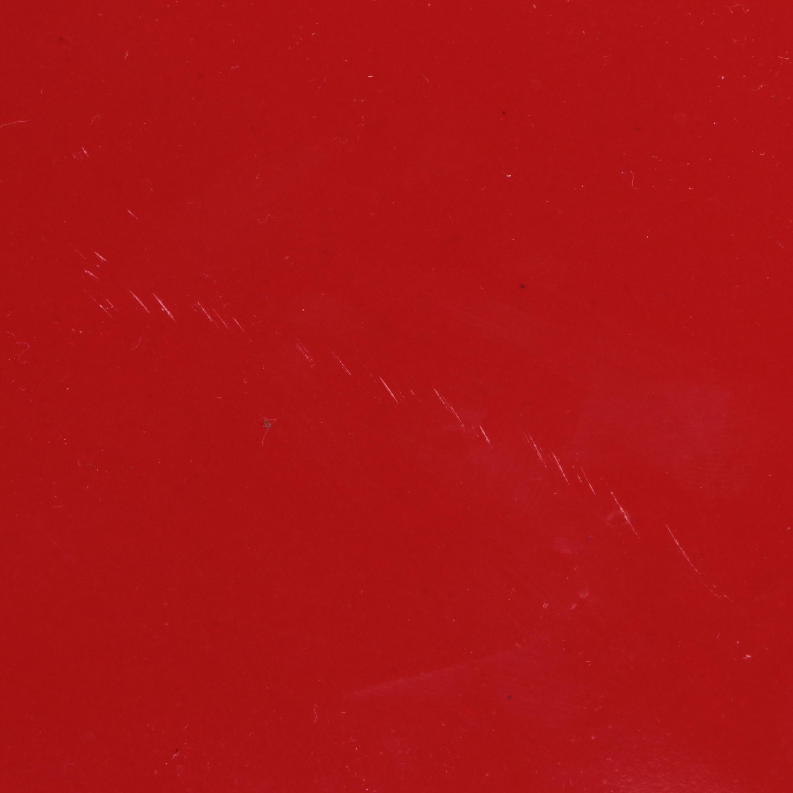 Red Glass Pitcher with Other Stoneware Dishes and Bowls