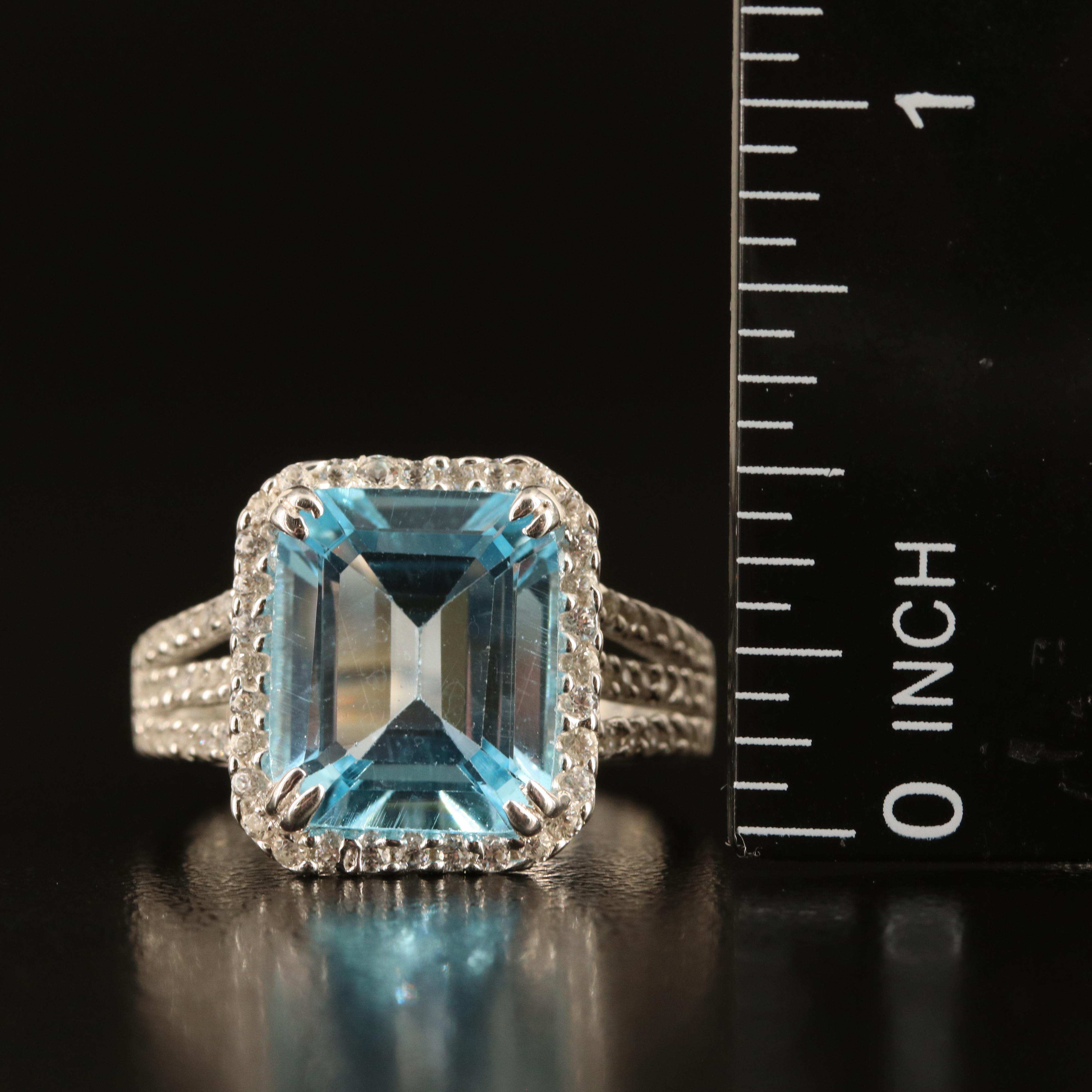 Sterling Sky Blue Topaz and White Zircon Ring