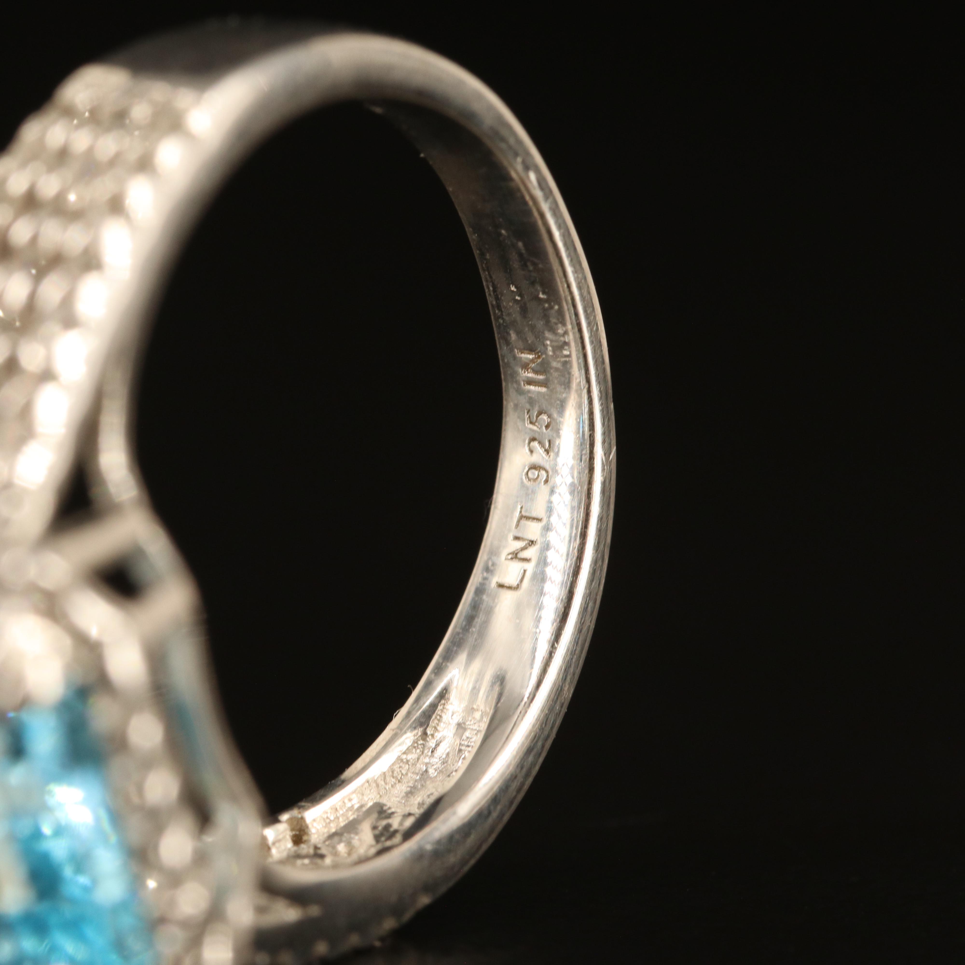 Sterling Sky Blue Topaz and White Zircon Ring