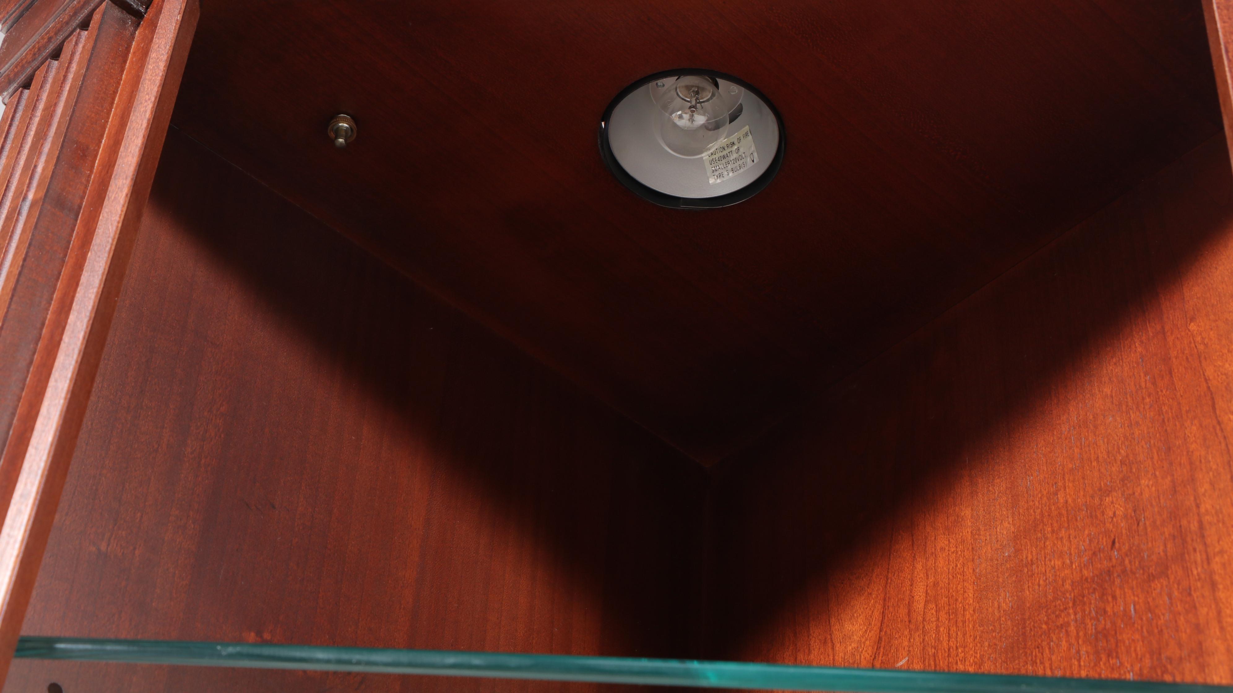 Two Hooker Furniture Mahogany Corner Cabinets