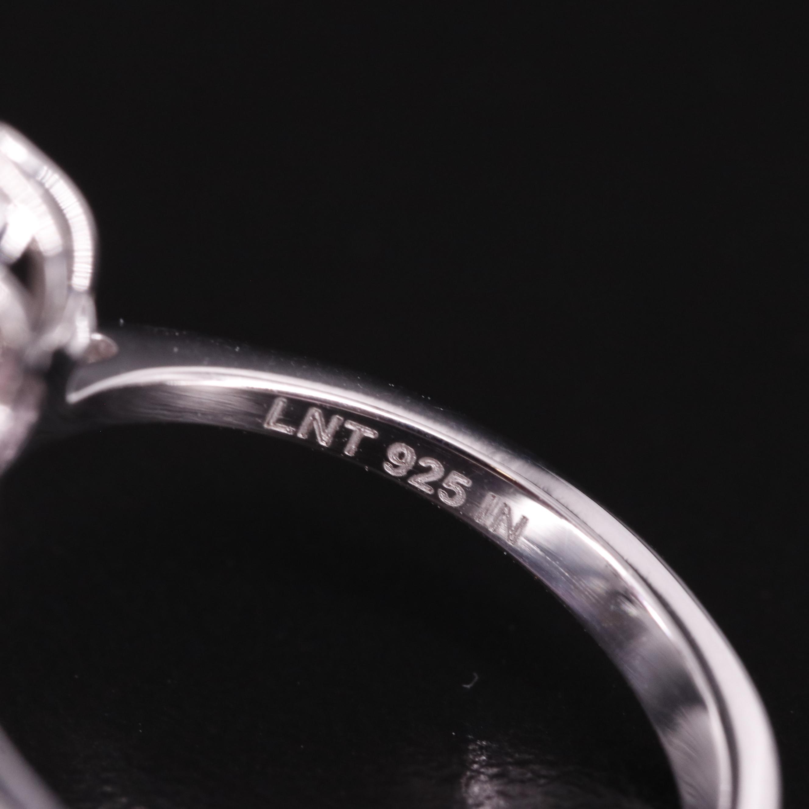 Sterling Topaz Halo Ring