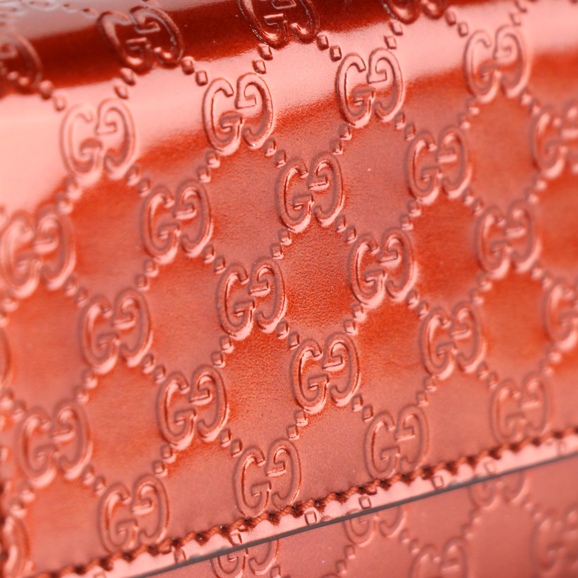 Gucci Compact Wallet in Microguccissima Patent Leather