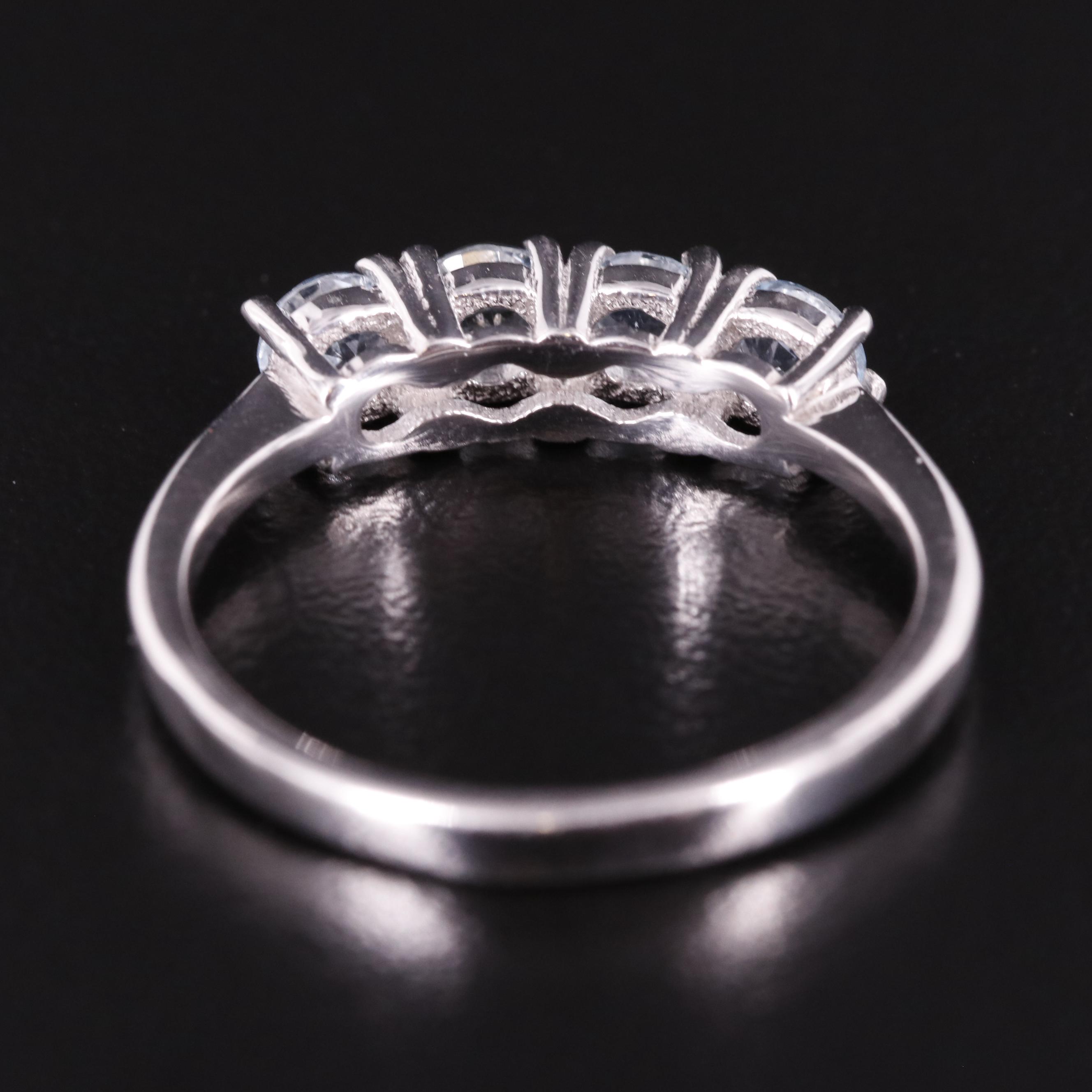 Sterling Four Stone Blue Topaz Ring