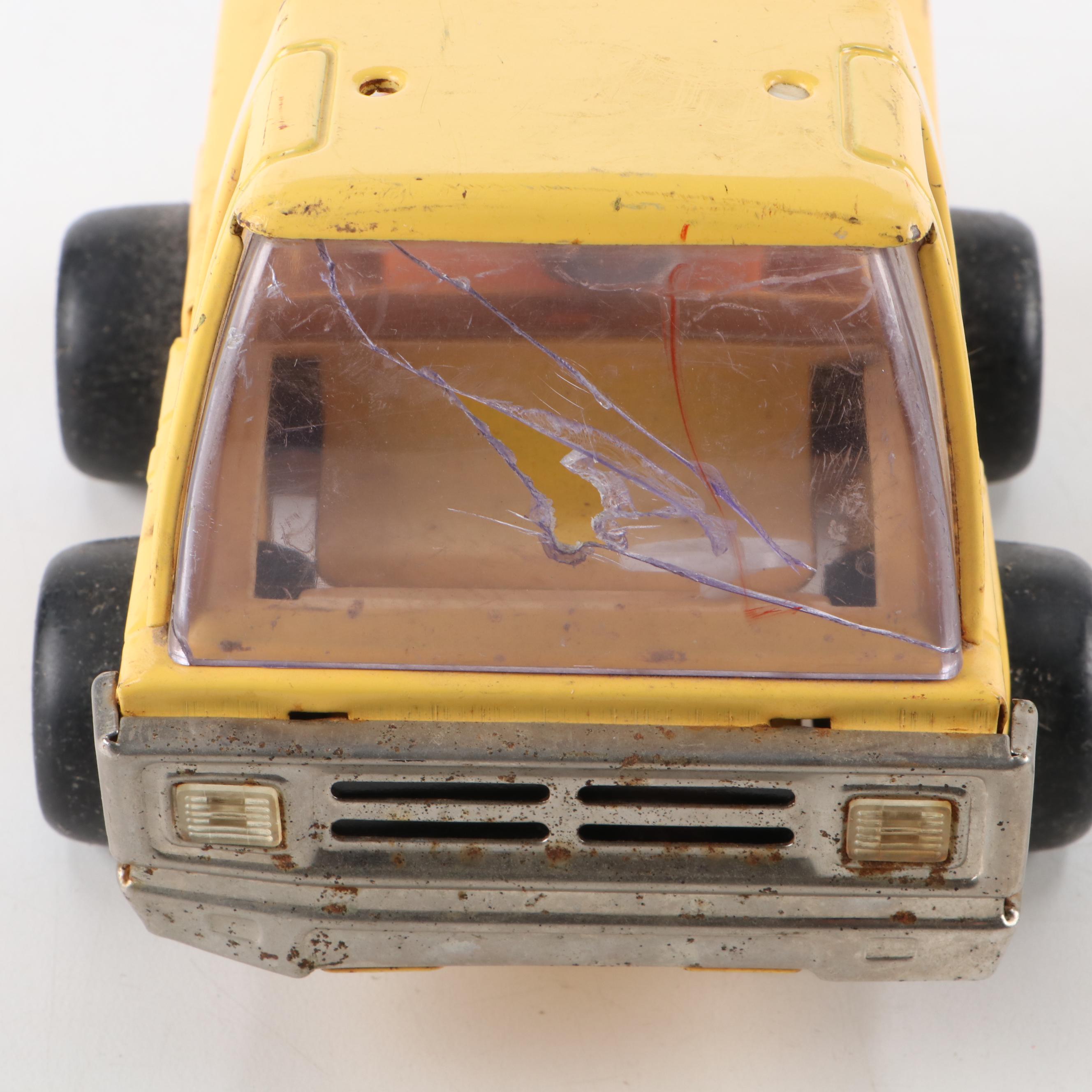 Japanese Diecast 1967 Camaro with Flip-Up Headlights and Yellow Tow Truck