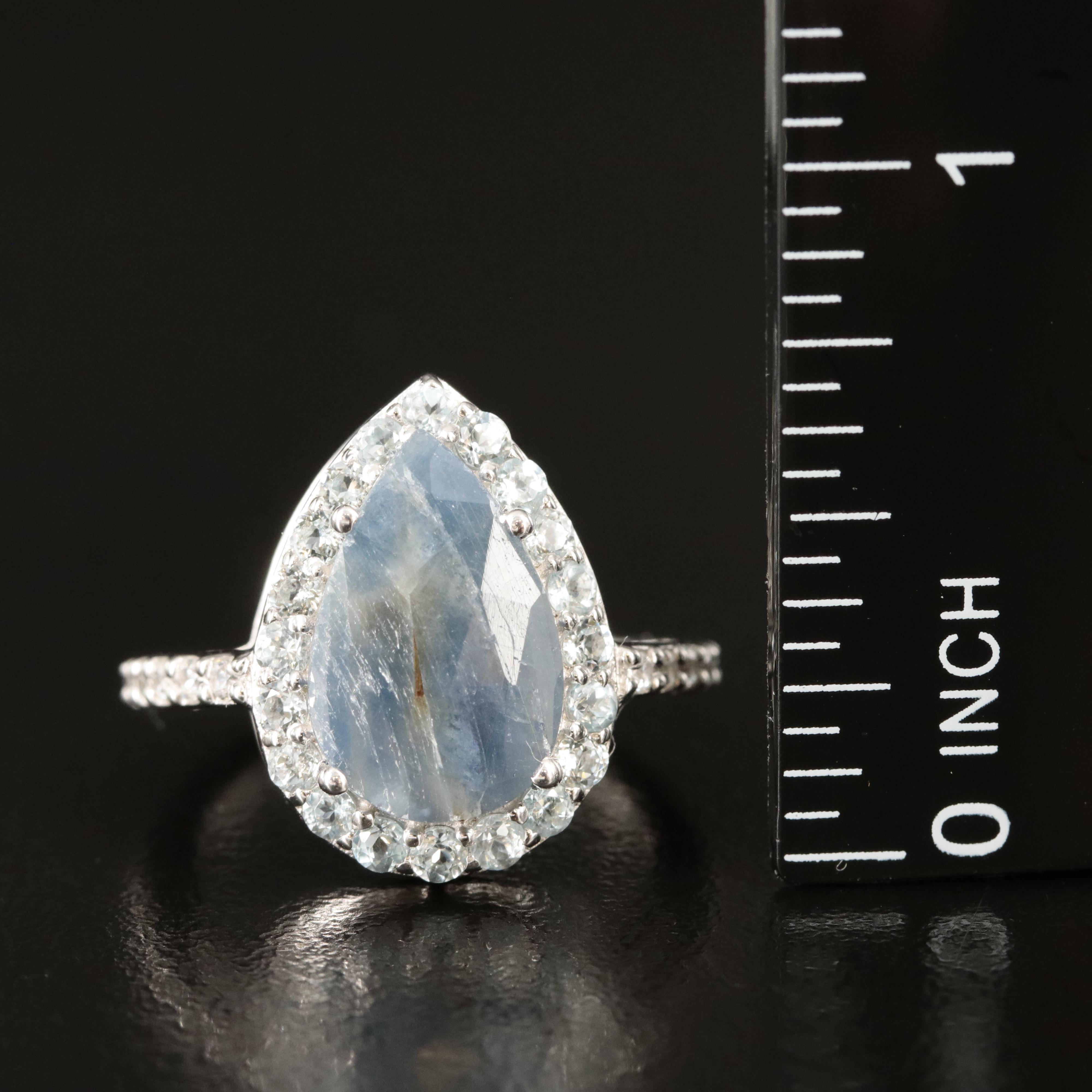 Sterling Sapphire and Topaz Teardrop Halo Ring