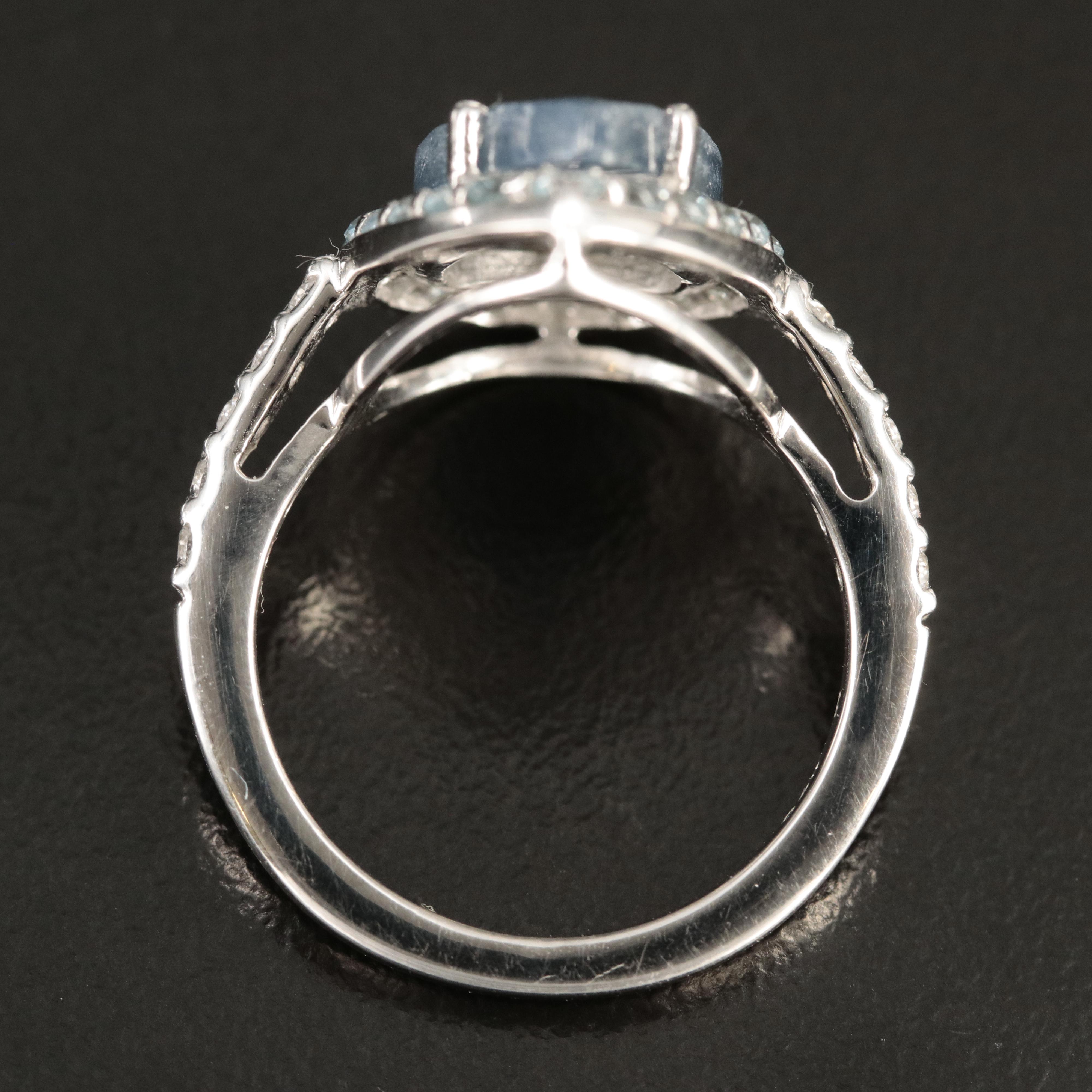 Sterling Sapphire and Topaz Teardrop Halo Ring