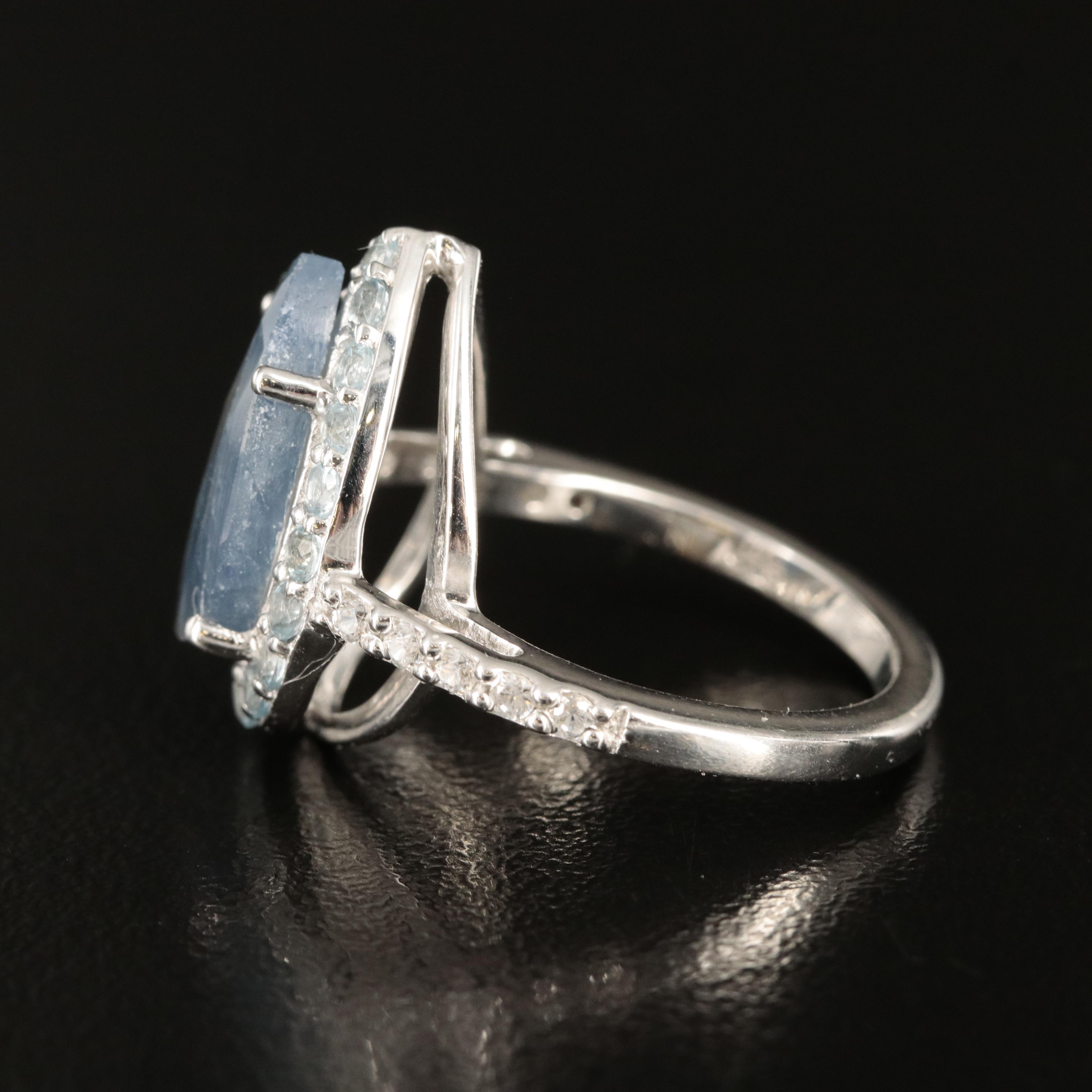 Sterling Sapphire and Topaz Teardrop Halo Ring