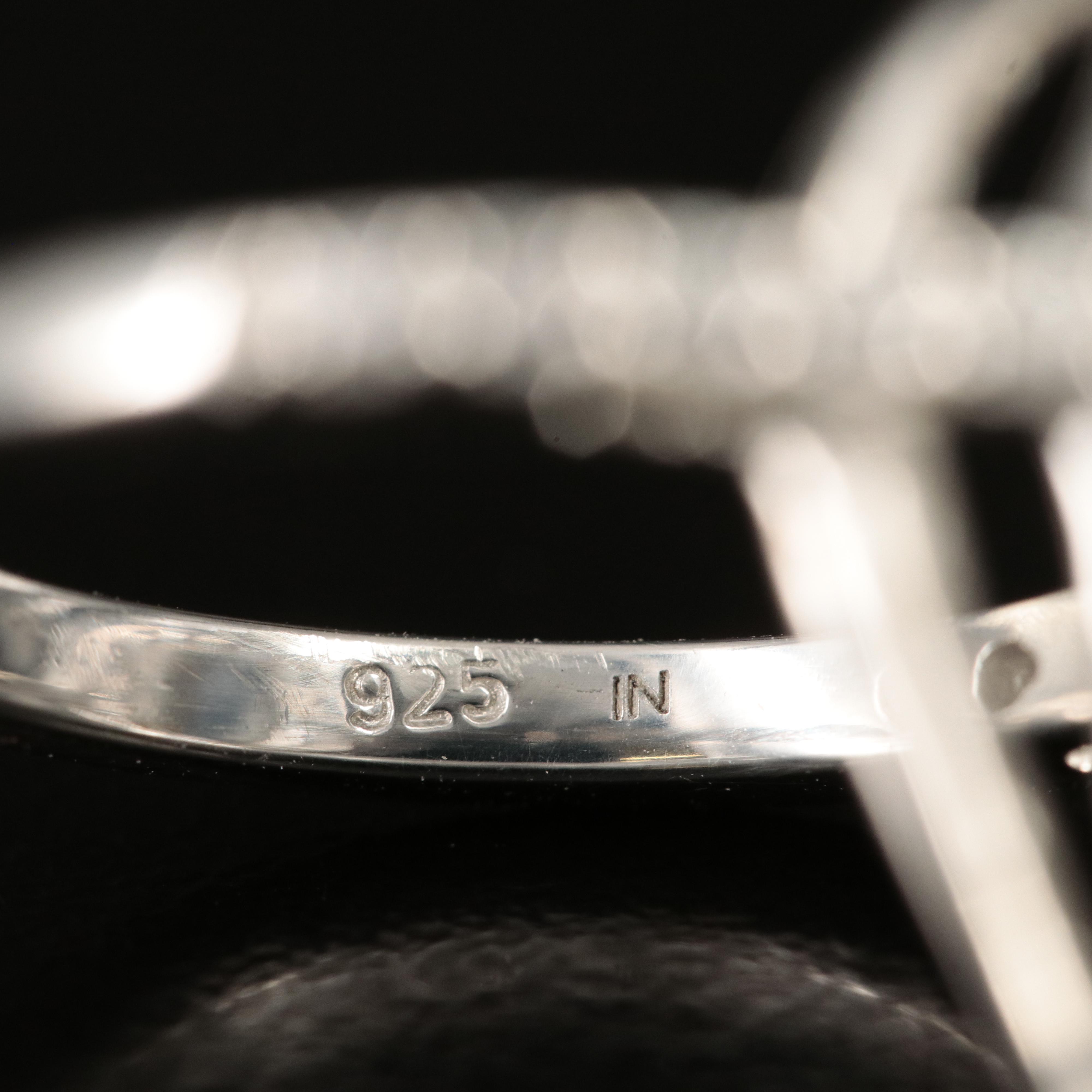 Sterling Sapphire and Topaz Teardrop Halo Ring