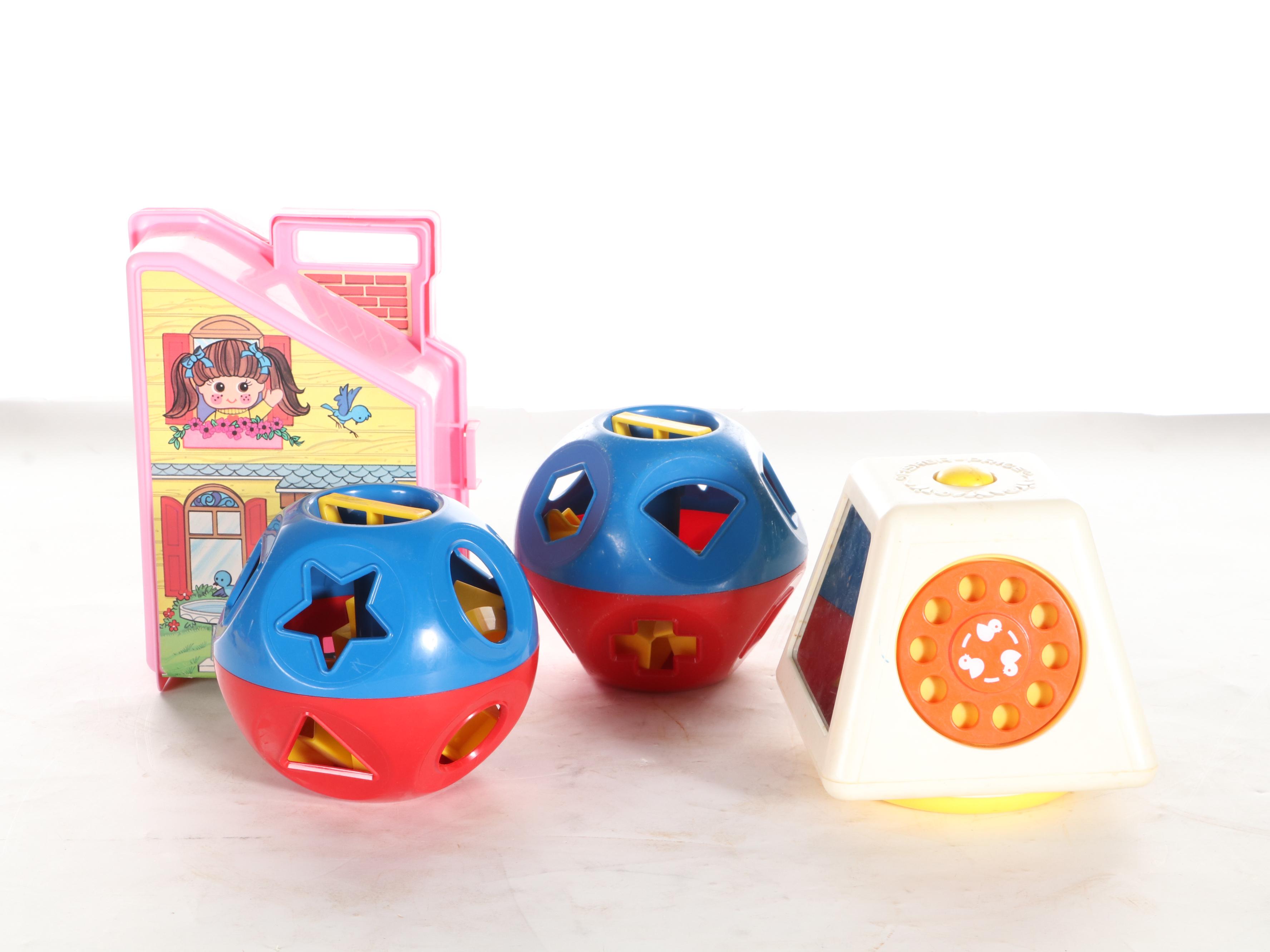 Fisher-Price Stacking Rings and Other Wooden and Plastic Toys