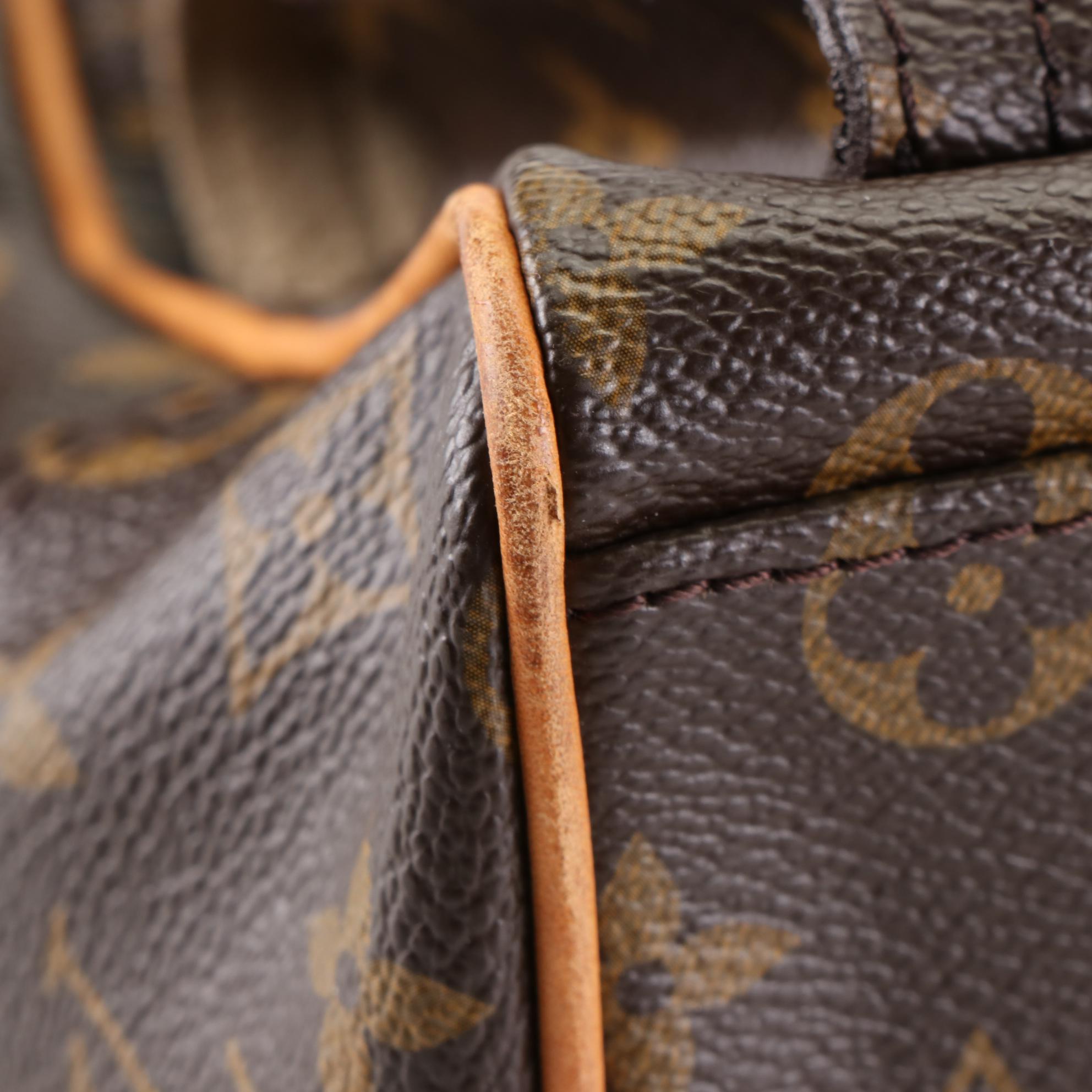 Louis Vuitton Manhattan Handbag PM  in Monogram Canvas and Vachetta Leather