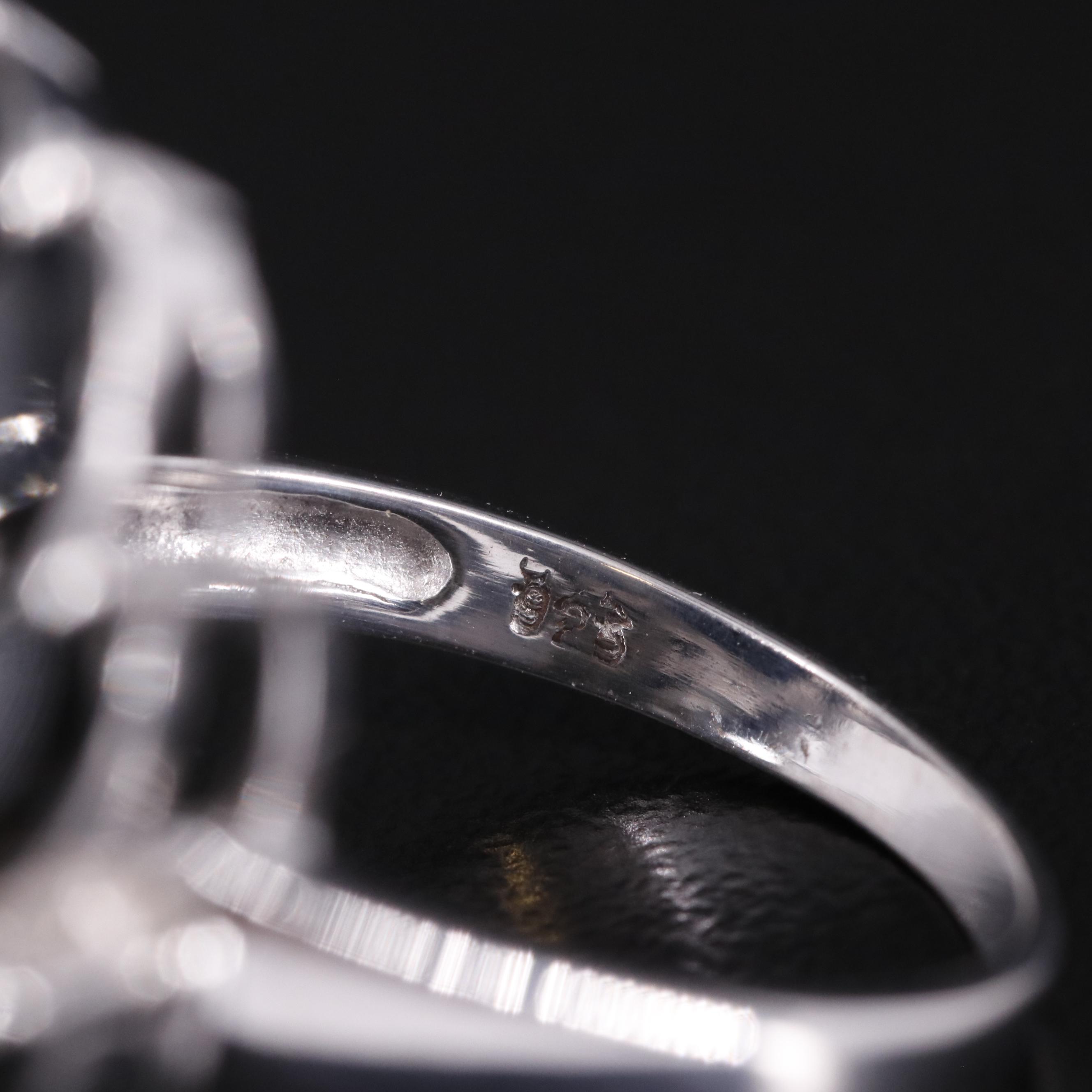 Sterling Cubic Zirconia Pinwheel Halo Ring