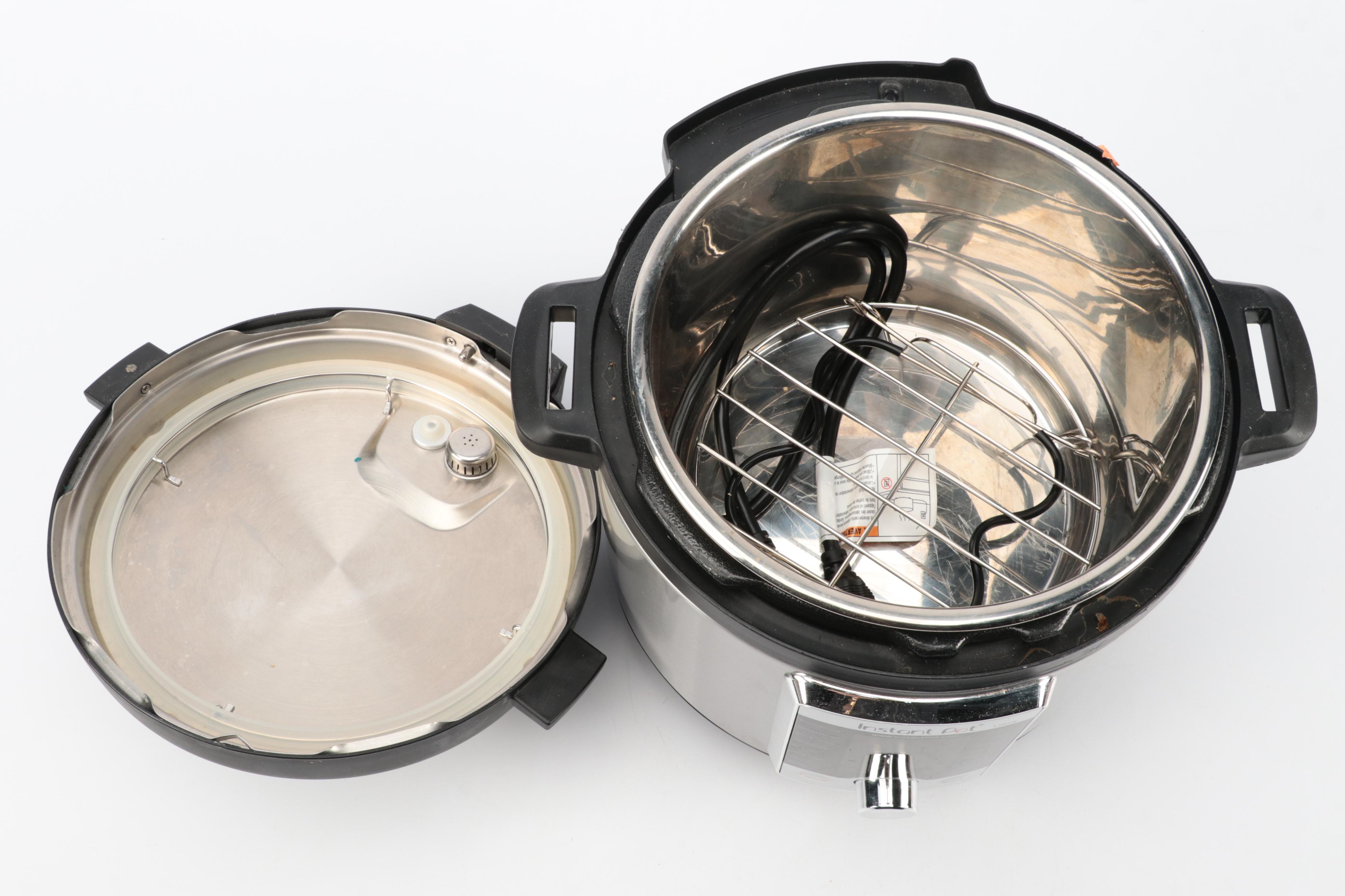 Insta Pot Ultra with Accessories and Cookbooks